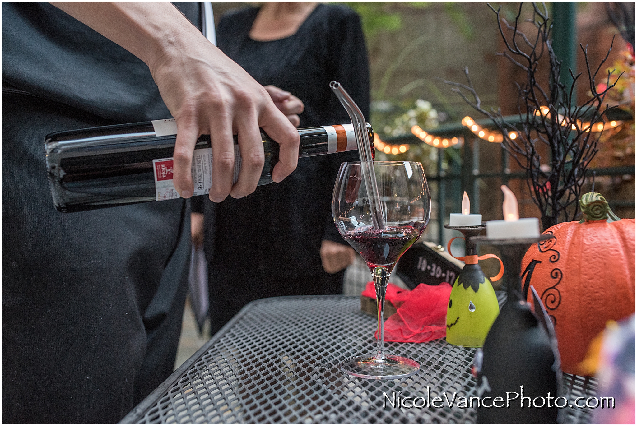 The wine is poured for a ceremonial drink together.