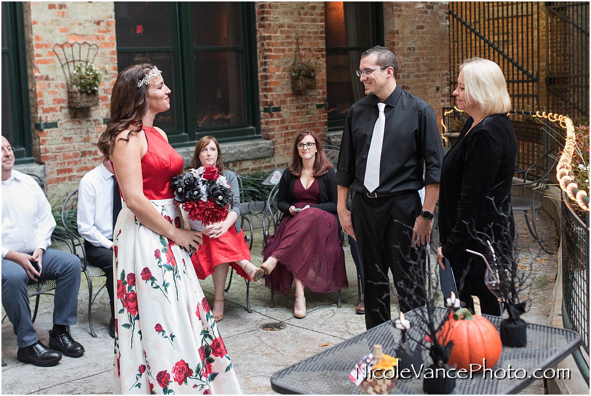 Wedding ceremony at Bookbinders on the back patio.