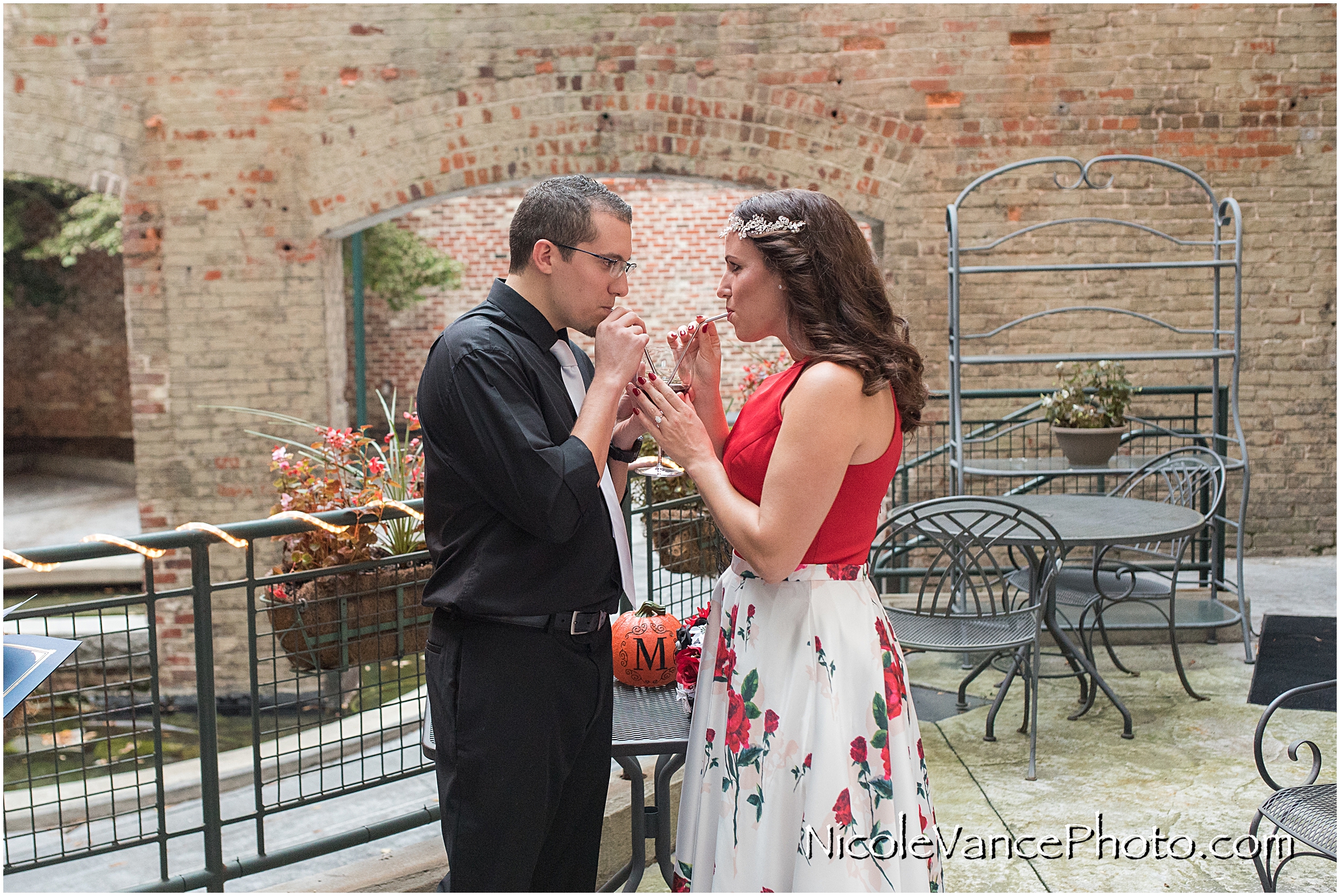 Ceremonial first drink together during the wedding ceremony.