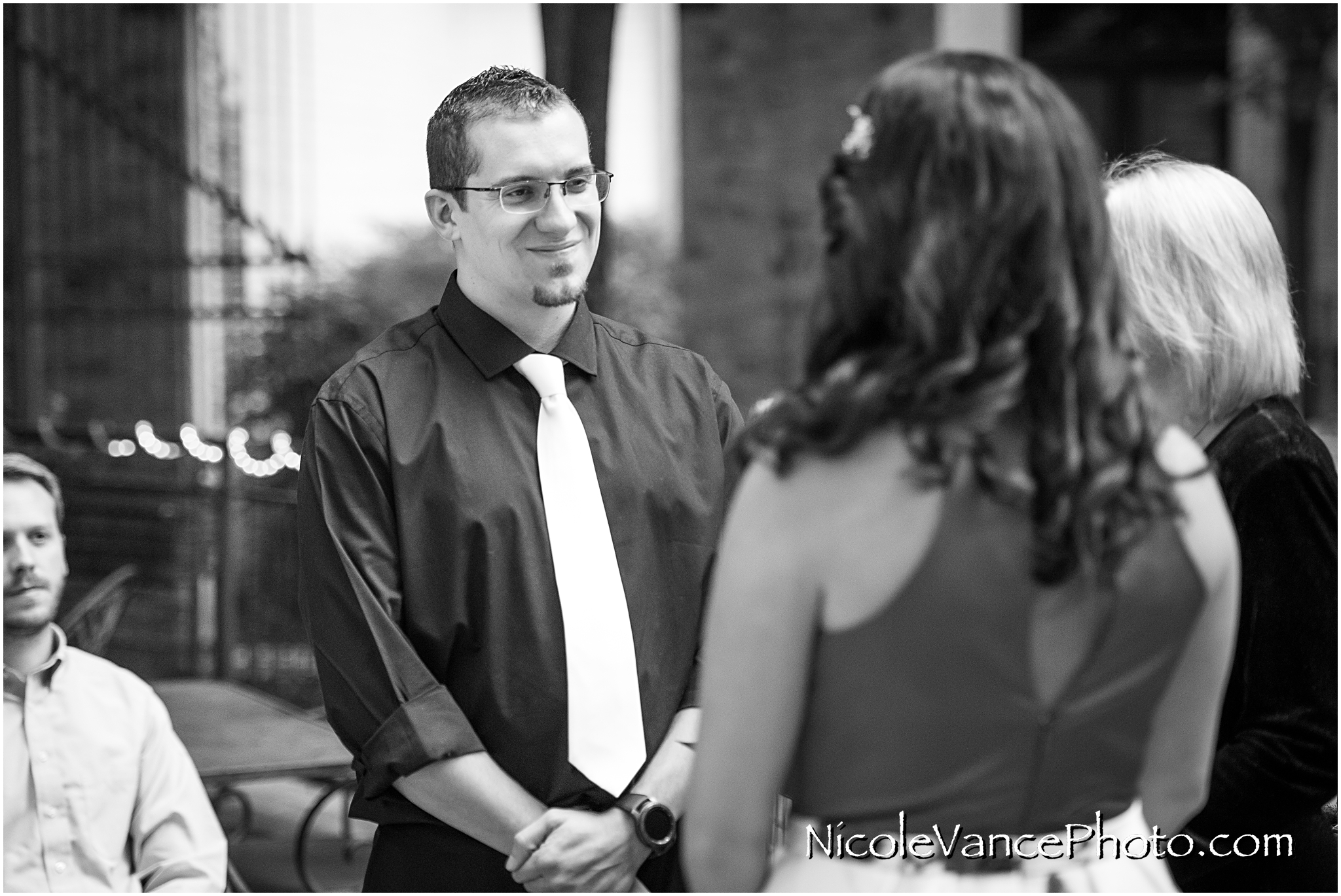 Wedding ceremony at Bookbinders on the back patio.