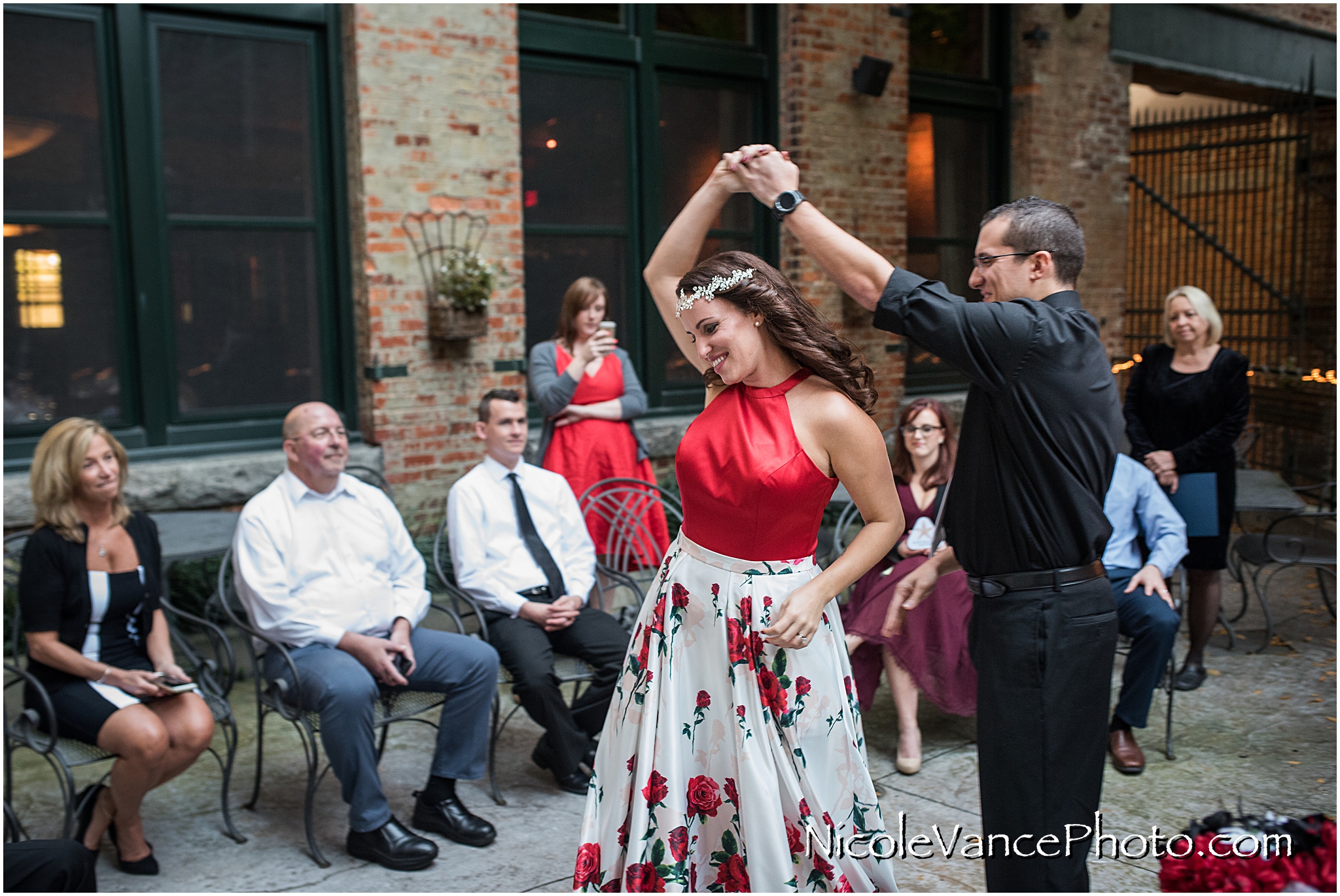 First dance after their wedding ceremony at Bookbinders on the back patio.