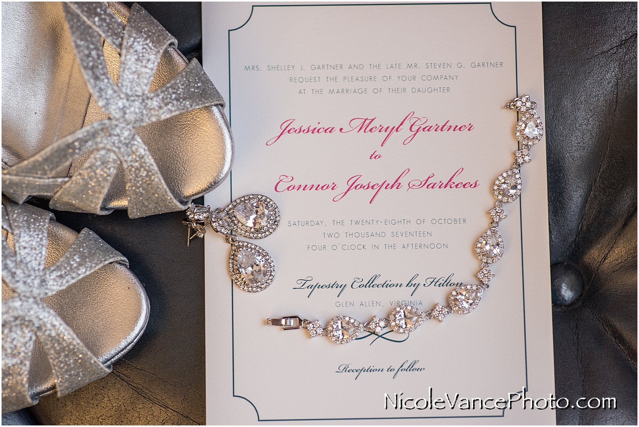 Wedding Invitation, by English Tea Paperie, based in Richmond VA, sits with other bridal details.