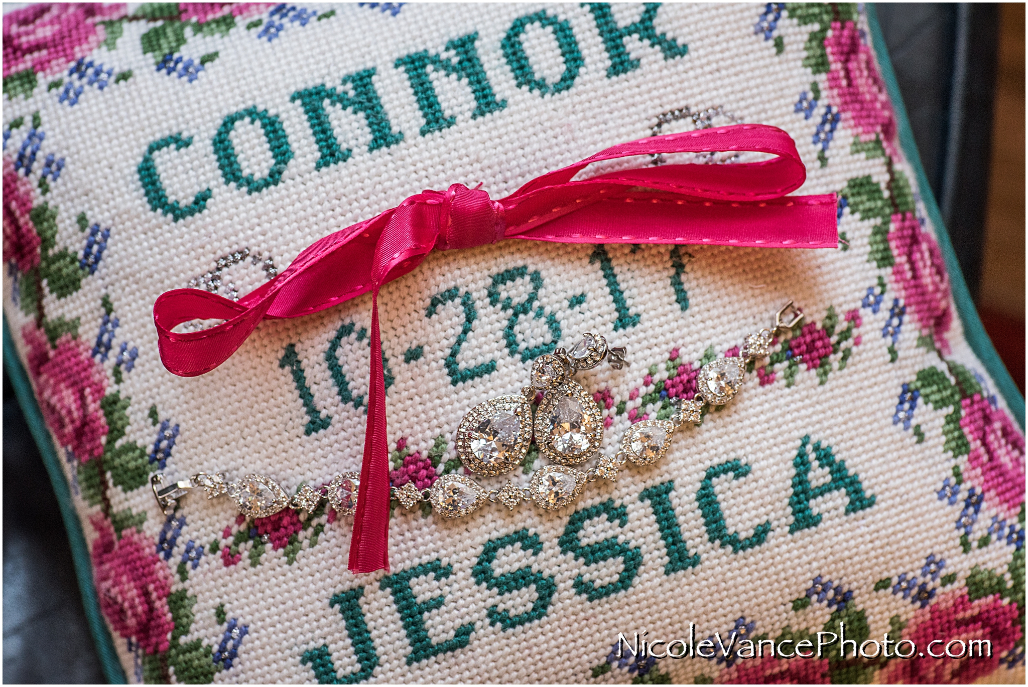 This handstiched needlepoint ring pillow is made bride's mom.