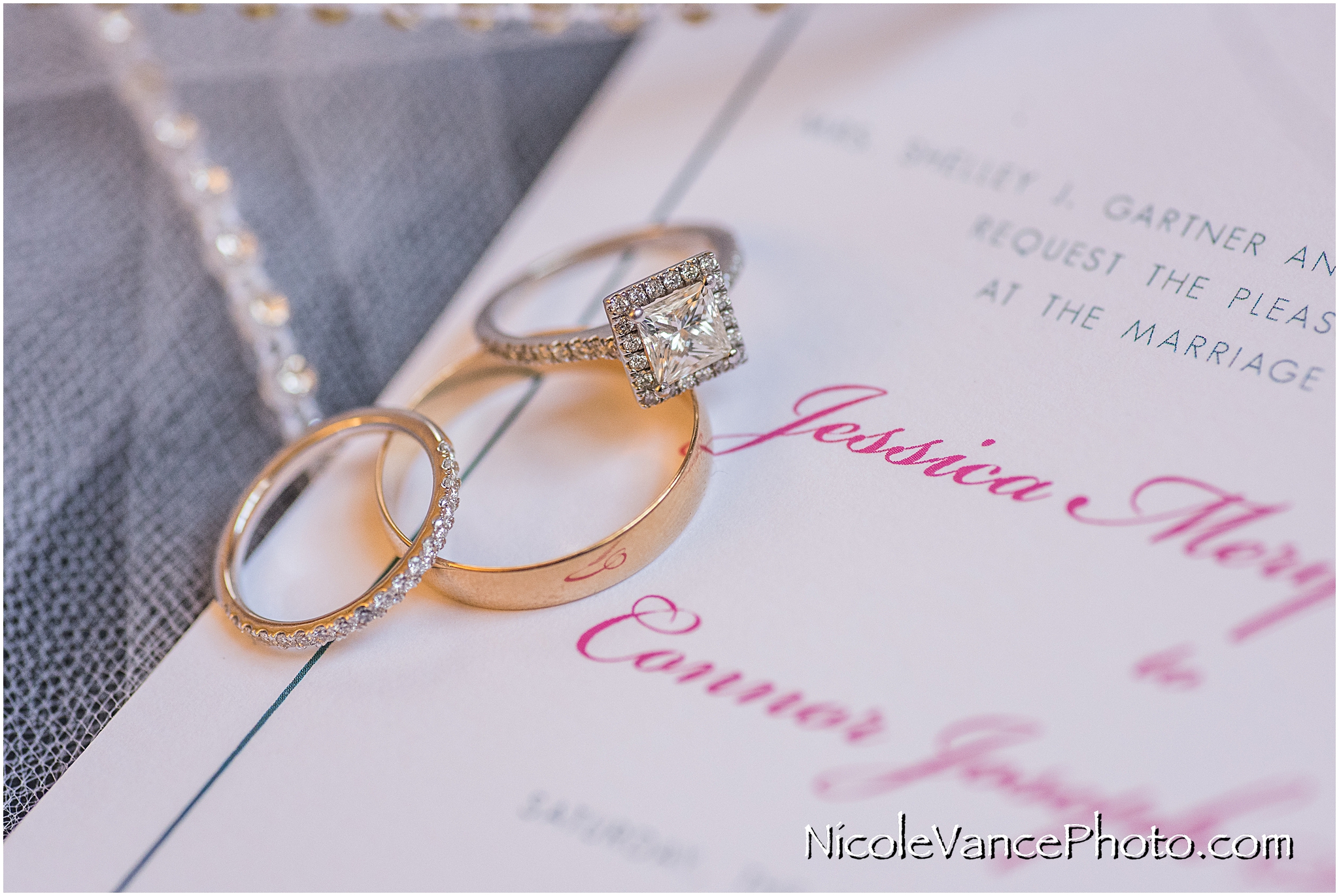 Wedding rings displayed with wedding invitation, made by English Tea Paperie.