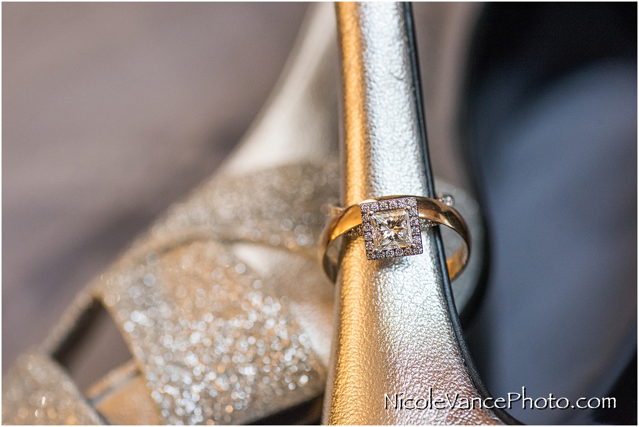 Wedding rings lie in wait with the bride's gorgeous shoes.