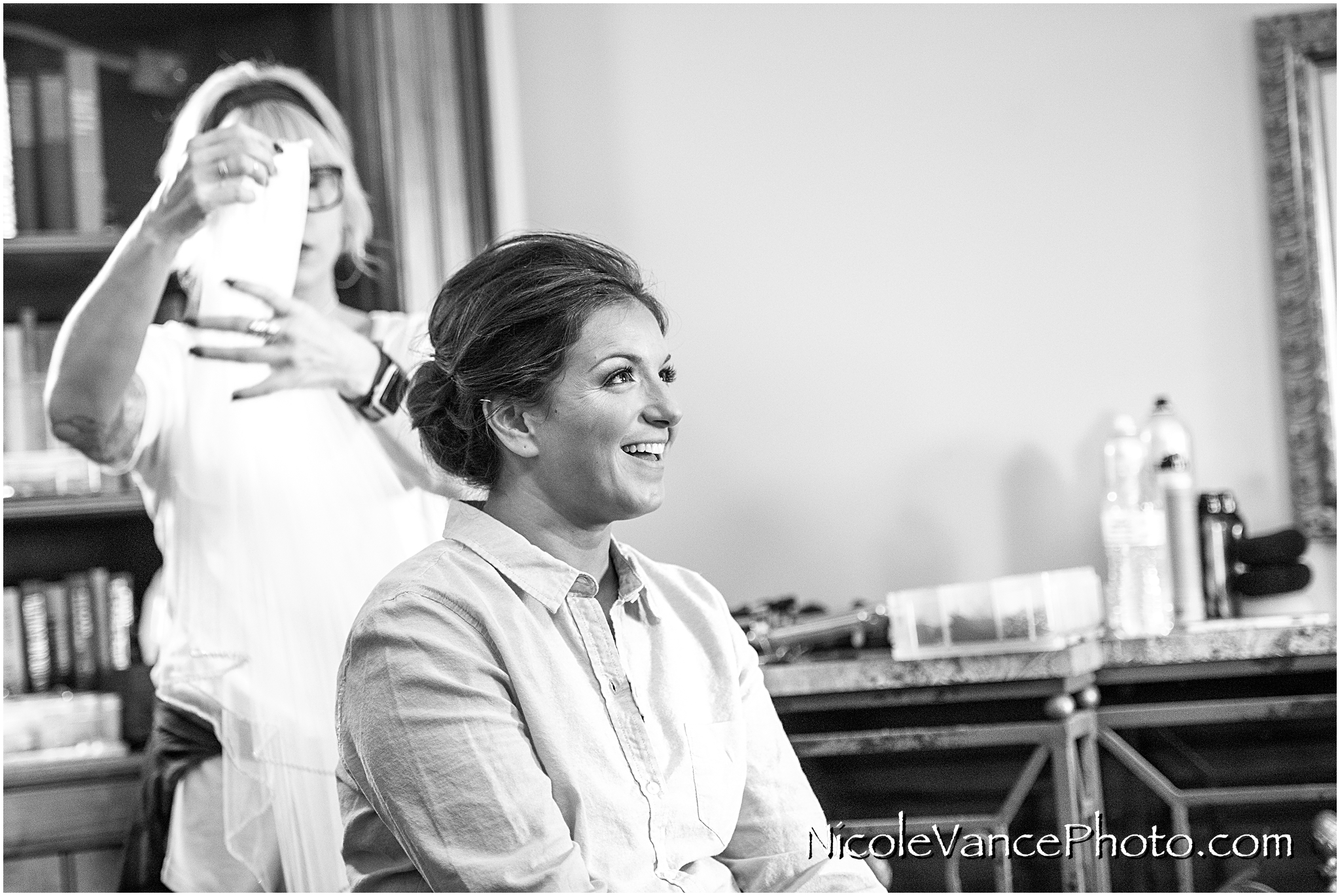 The bride's hair is complete, hair and makeup was done by Jennifer Saunders Bridal.