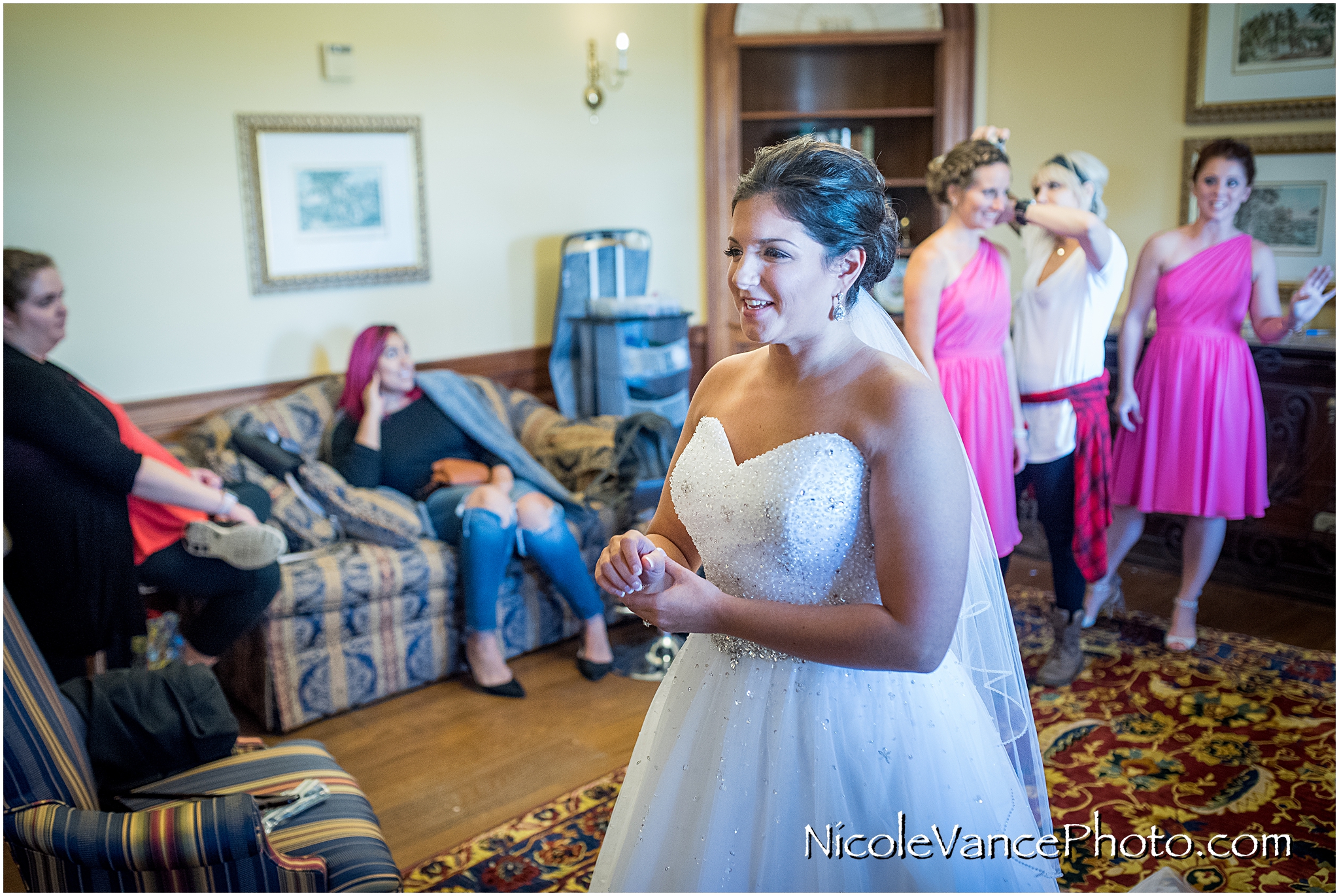 The bride is excited for her wedding day at Virginia Crossings.