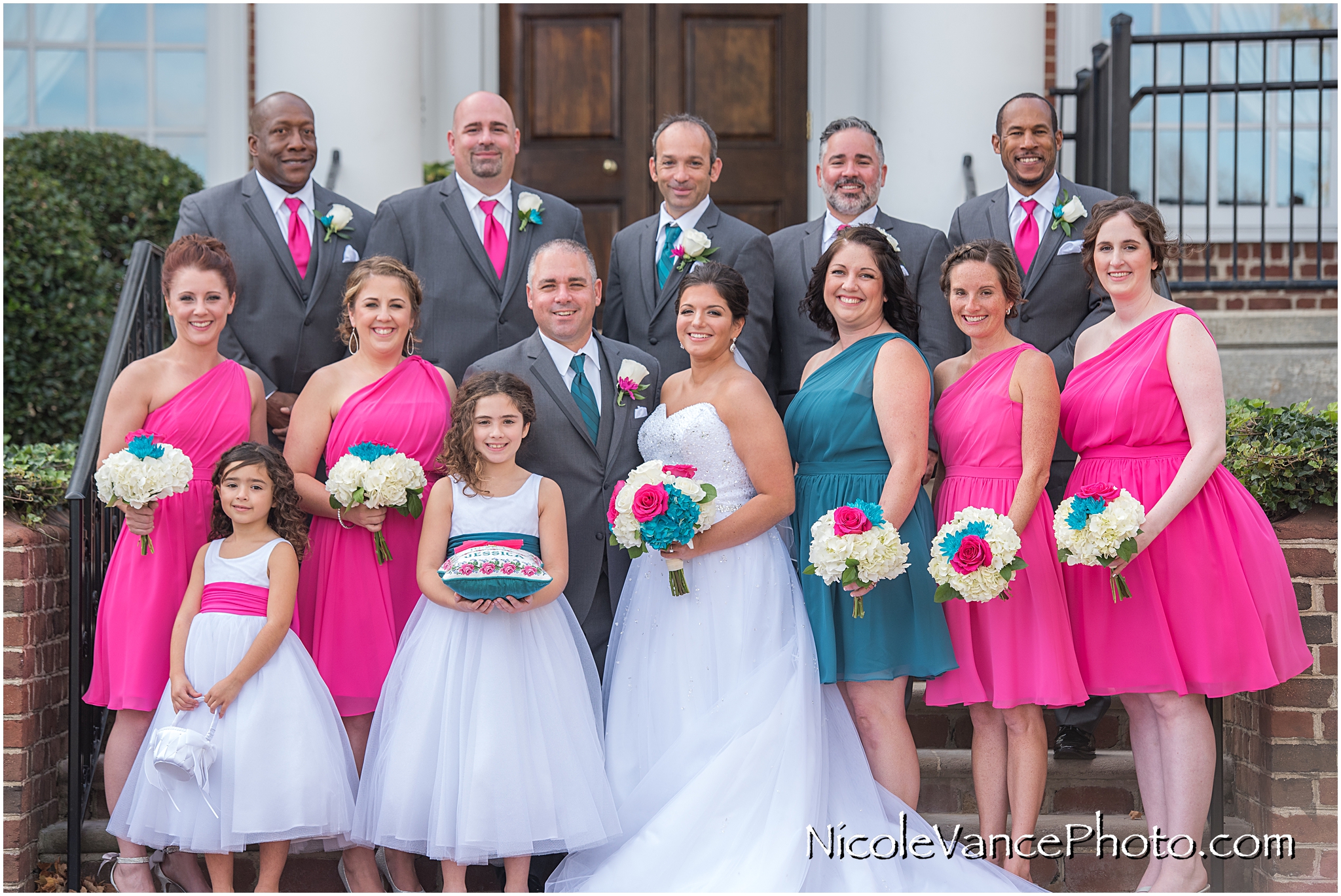 Wedding party portrait on the steps at Virginia Crossings.