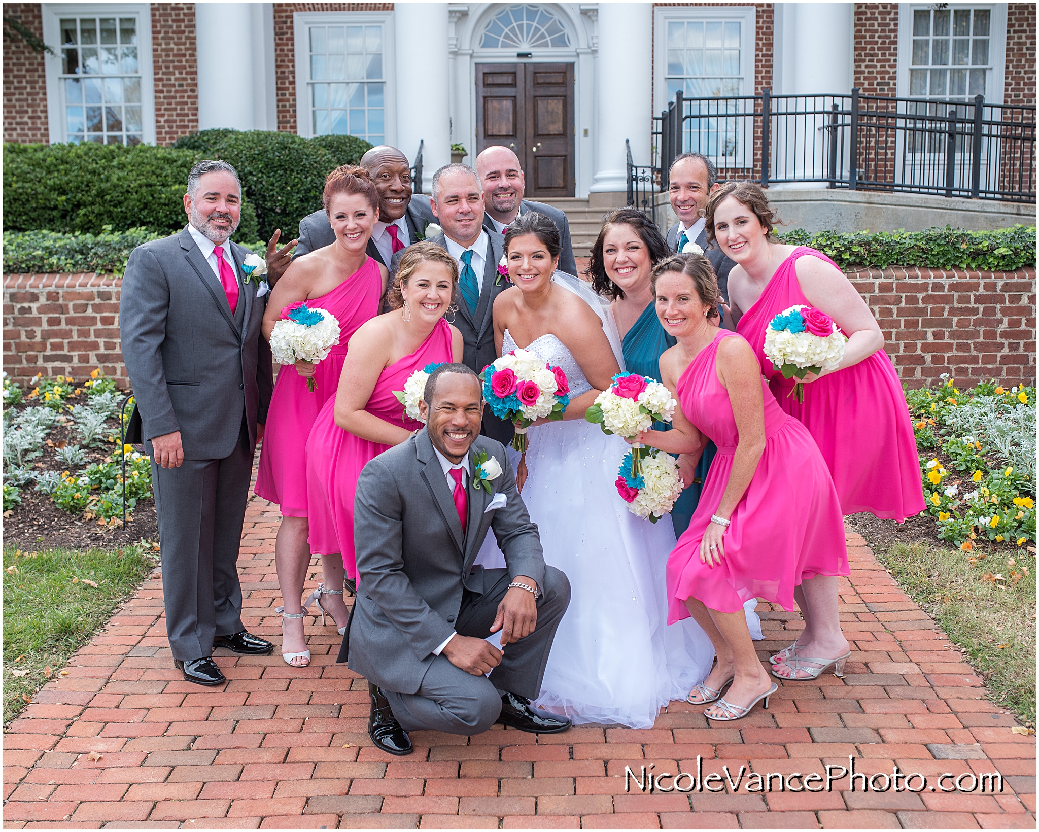 Wedding party portrait on the steps at Virginia Crossings.