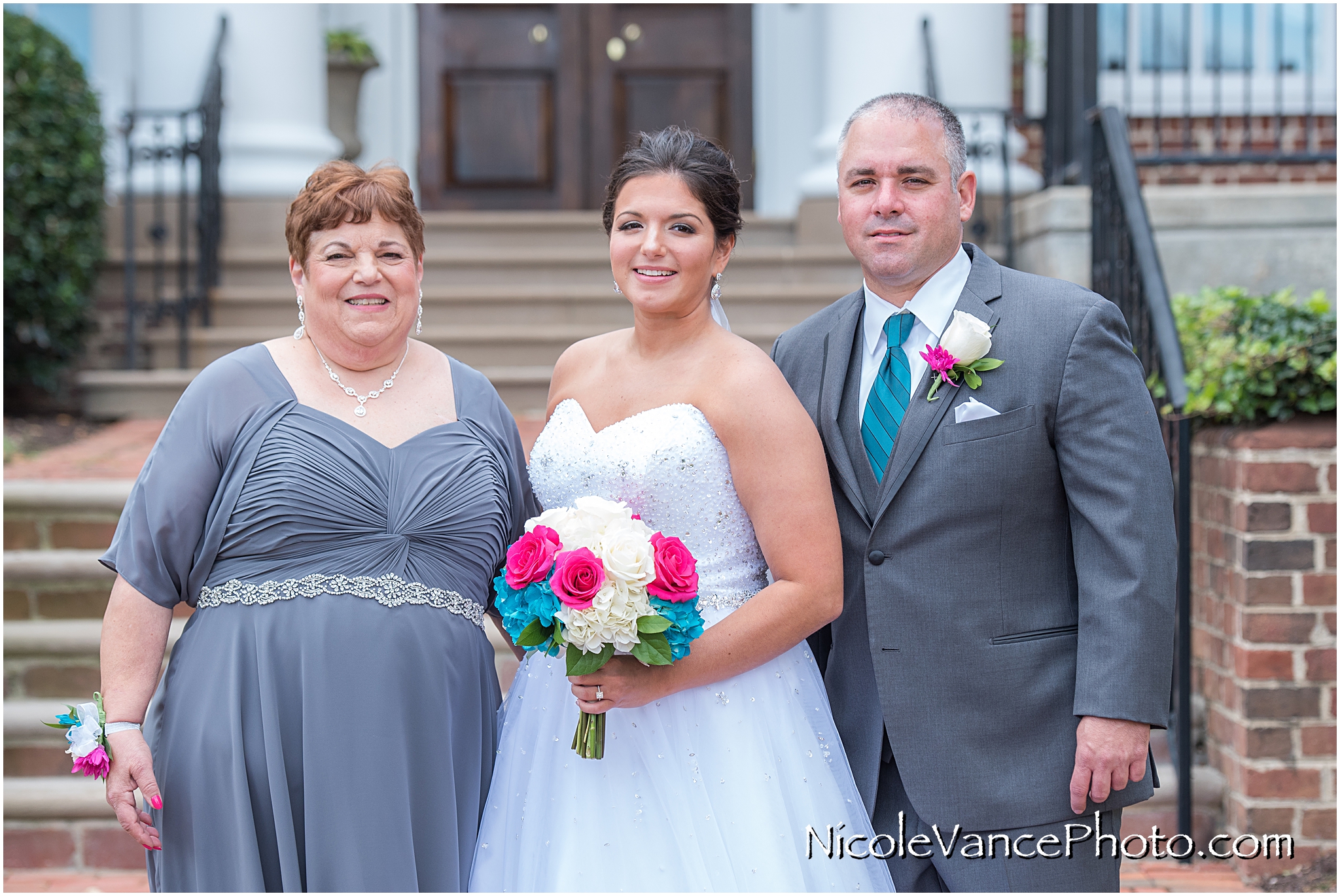 Family portraits on the steps at Virginia Crossings.