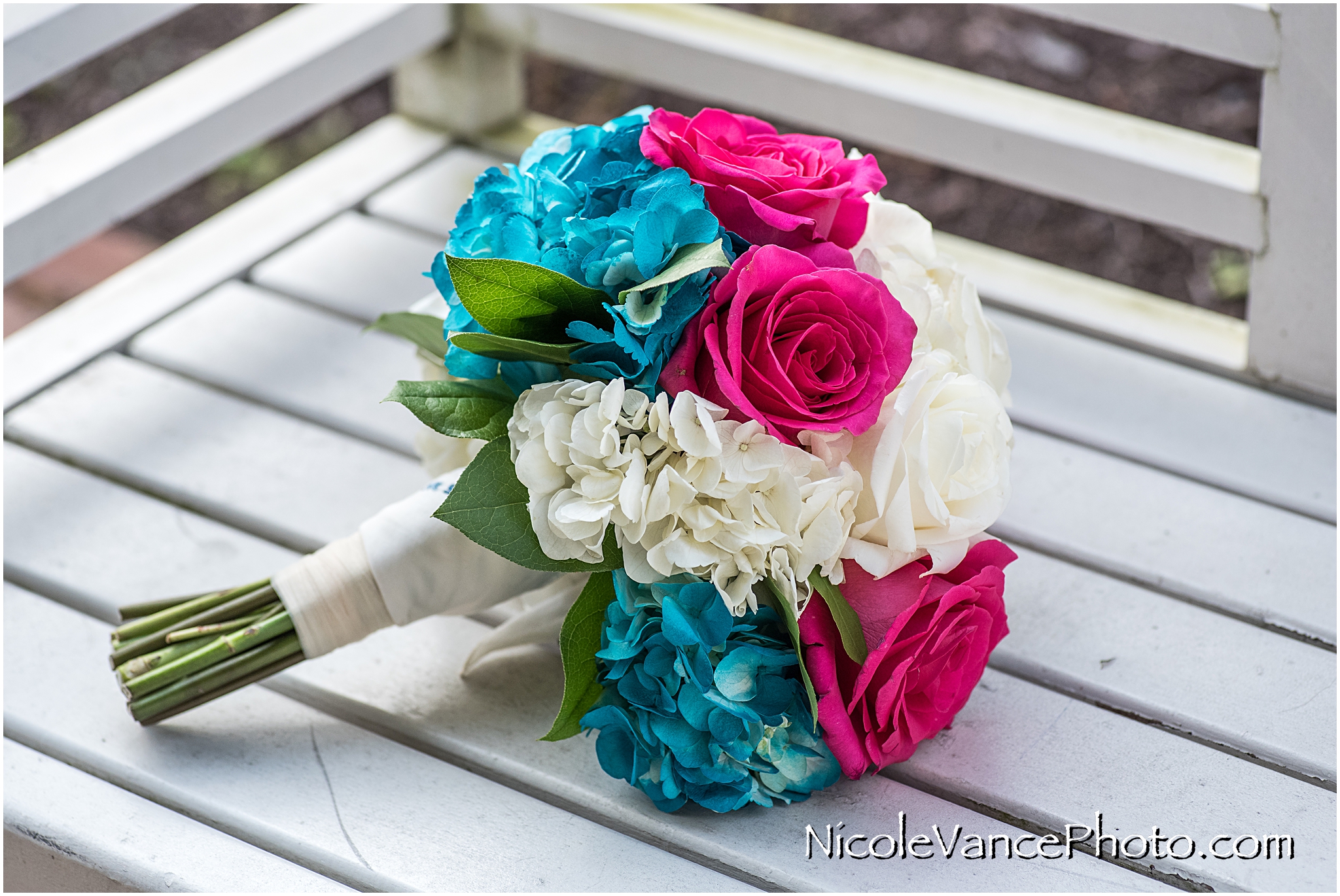 This bridal bouquet was designed by Flowers by Zoie.