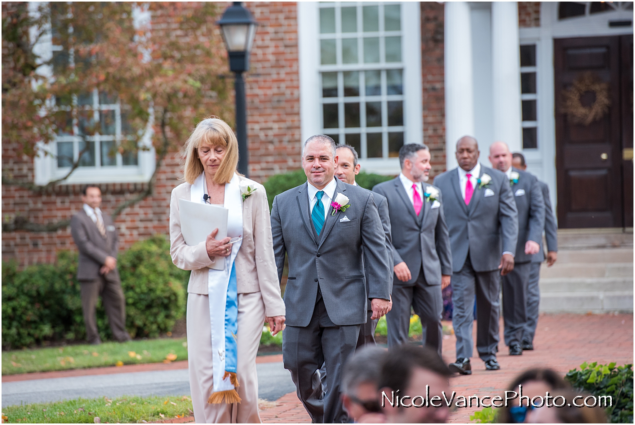 The groom exits "The Tavern" to the ceremony site at Virginia Crossings.