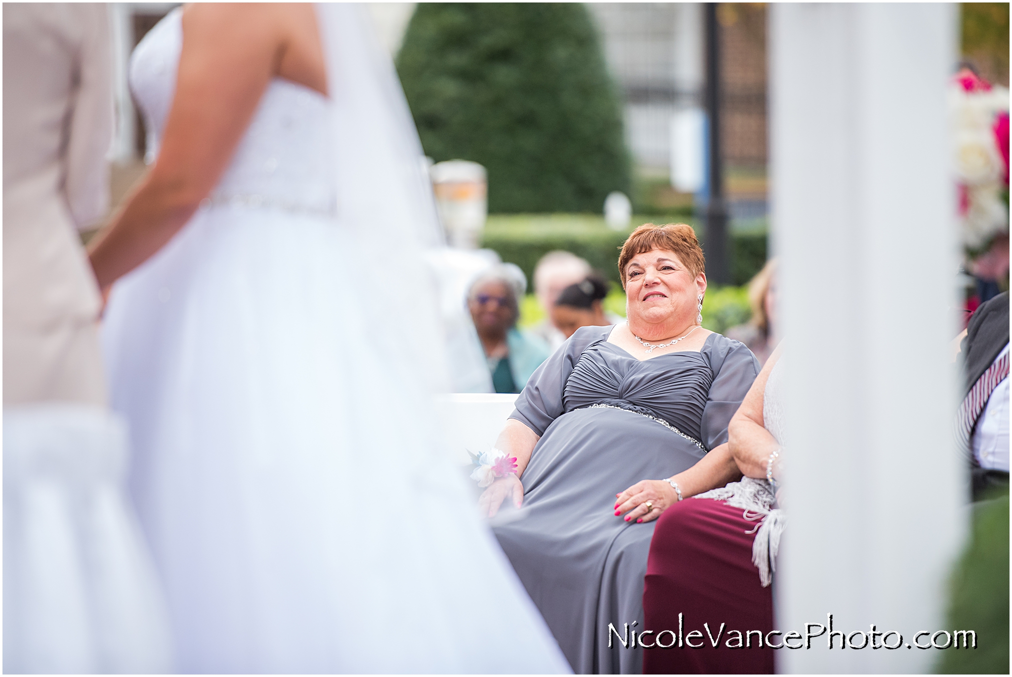 The bride's mother during the wedding ceremony at Virginia Crossings.