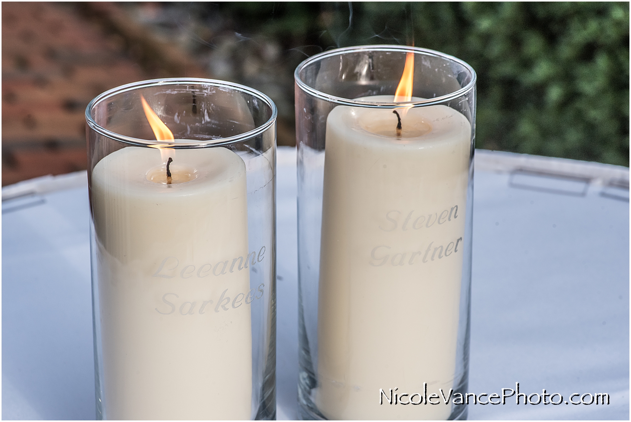 Memorial candles for the bride and groom's deceased parents, which were lit during the ceremony.