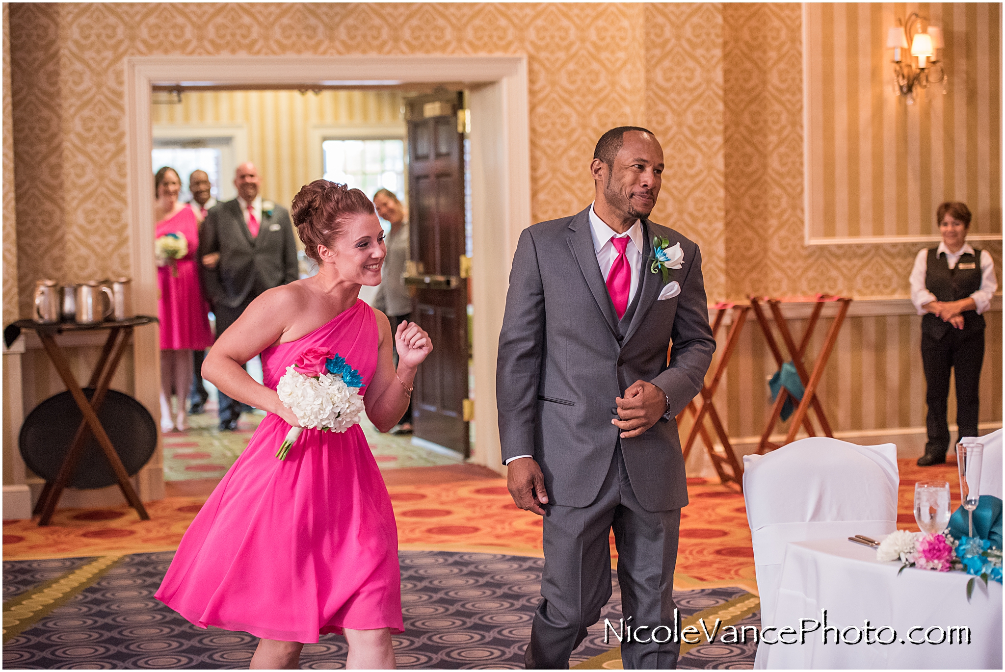 Family and Bridal party enter the Wedding Reception at Virginia Crossings.