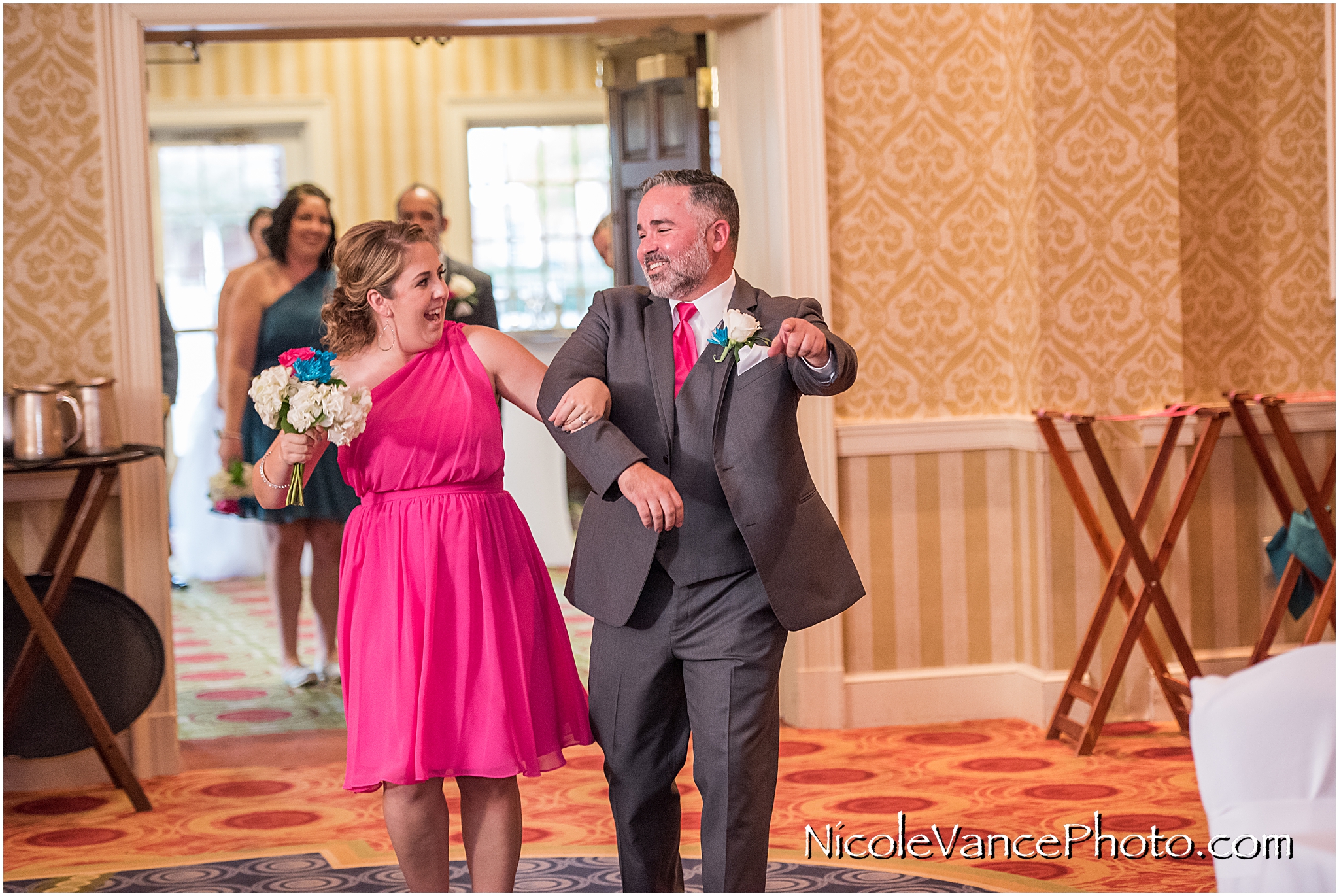 Family and Bridal party enter the Wedding Reception at Virginia Crossings.