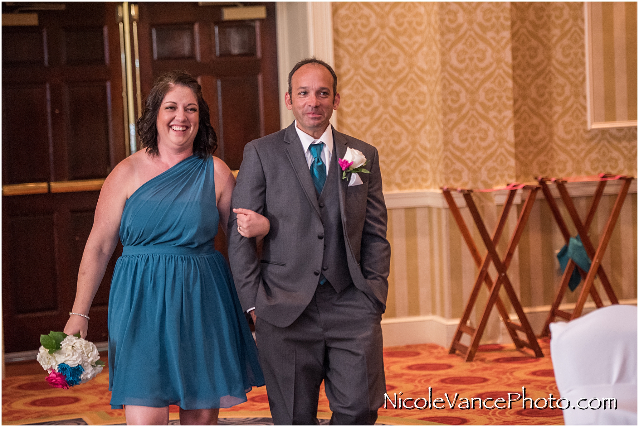 Family and Bridal party enter the Wedding Reception at Virginia Crossings.