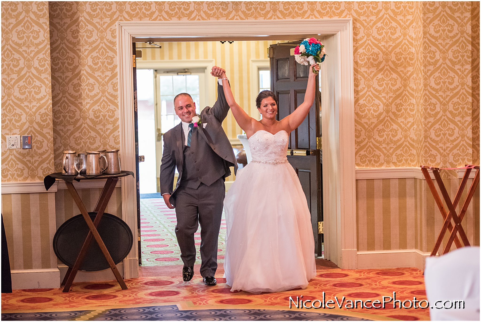 Bride and Groom enter the Wedding Reception at Virginia Crossings.