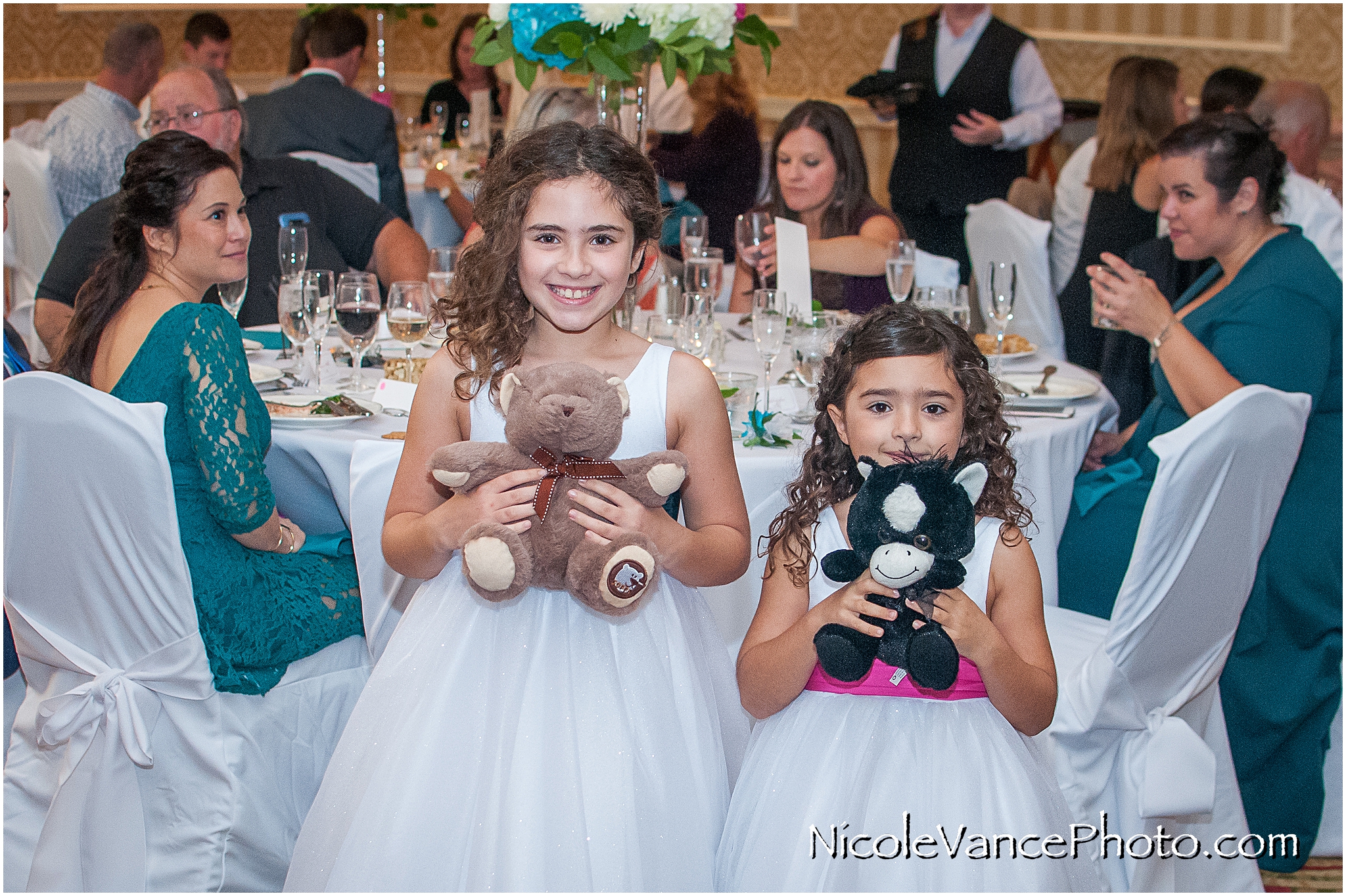 The flower girls and their special gifts from the groom.