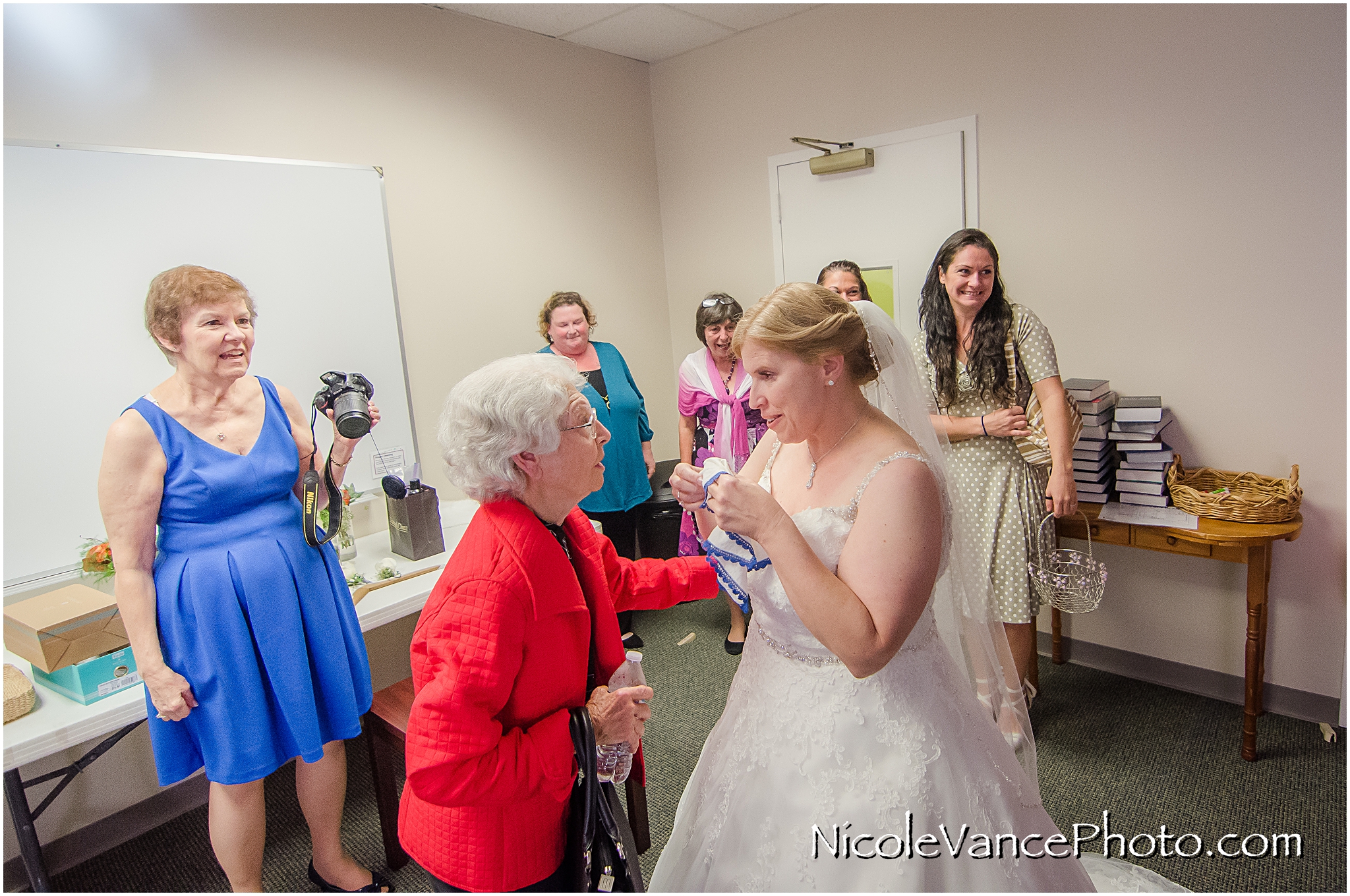 Family come visit the bride before her wedding ceremony.