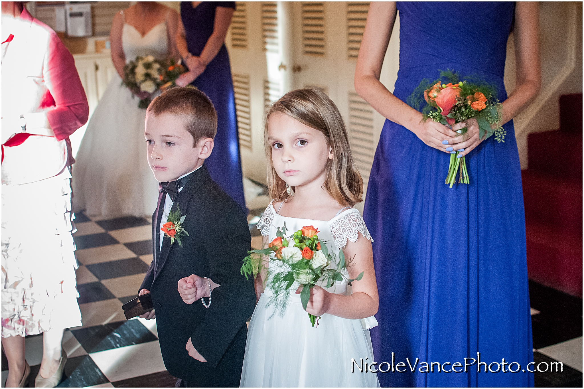 The flower girl and ring bearer prepare to go down the aisle for the wedding ceremony at Third Church.