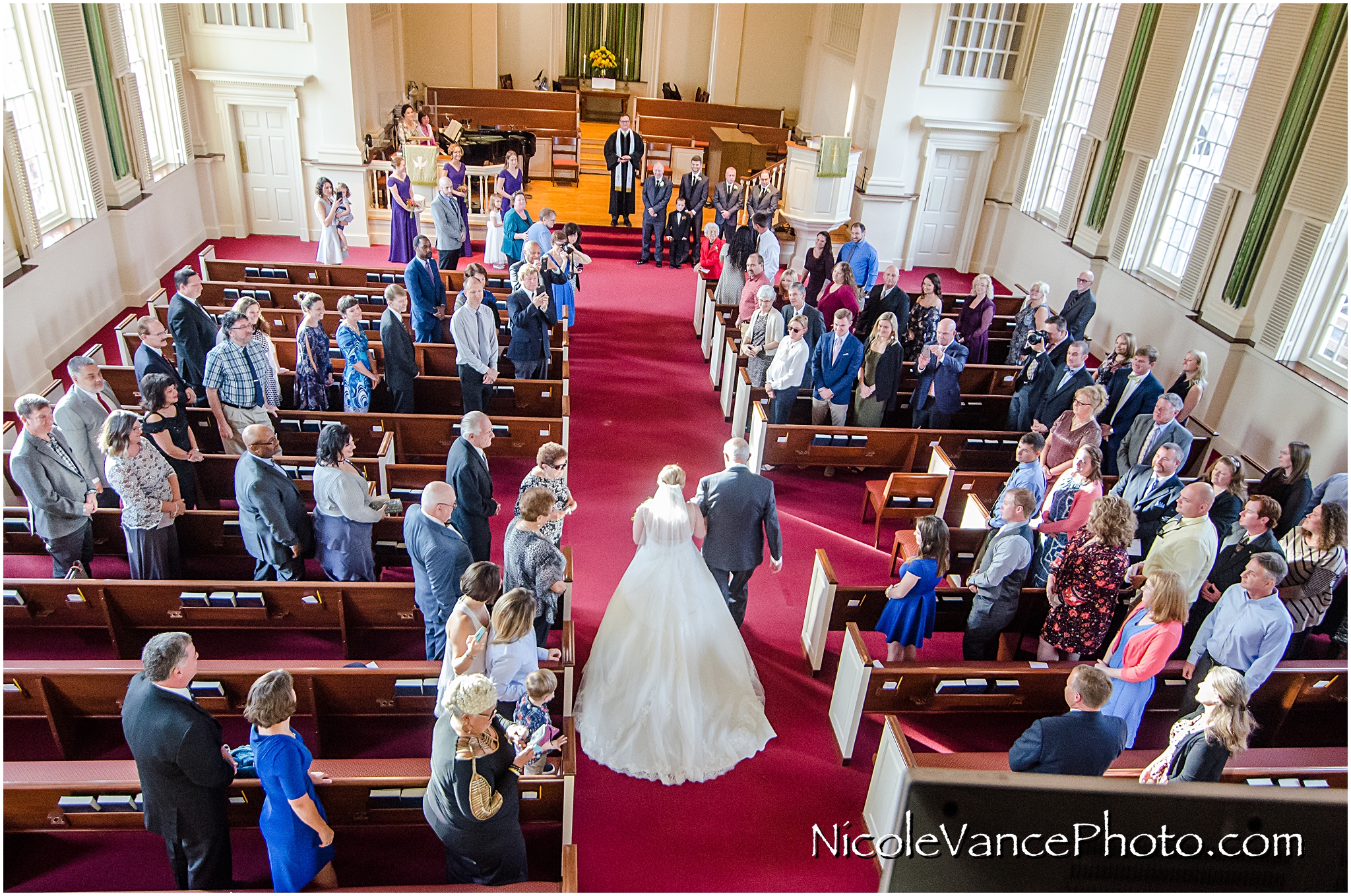 The bride makes a grand entrance at Third Church.