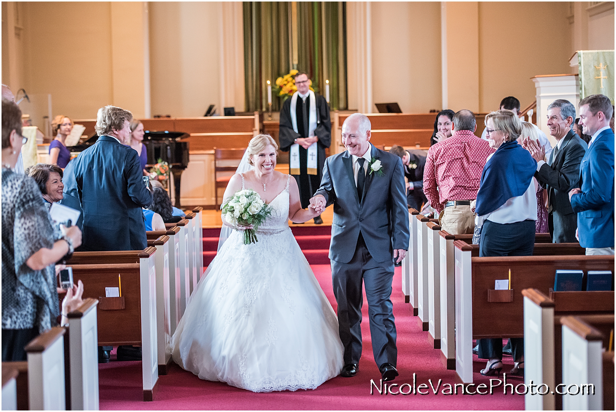 Don't they look so happy coming back down the aisle?