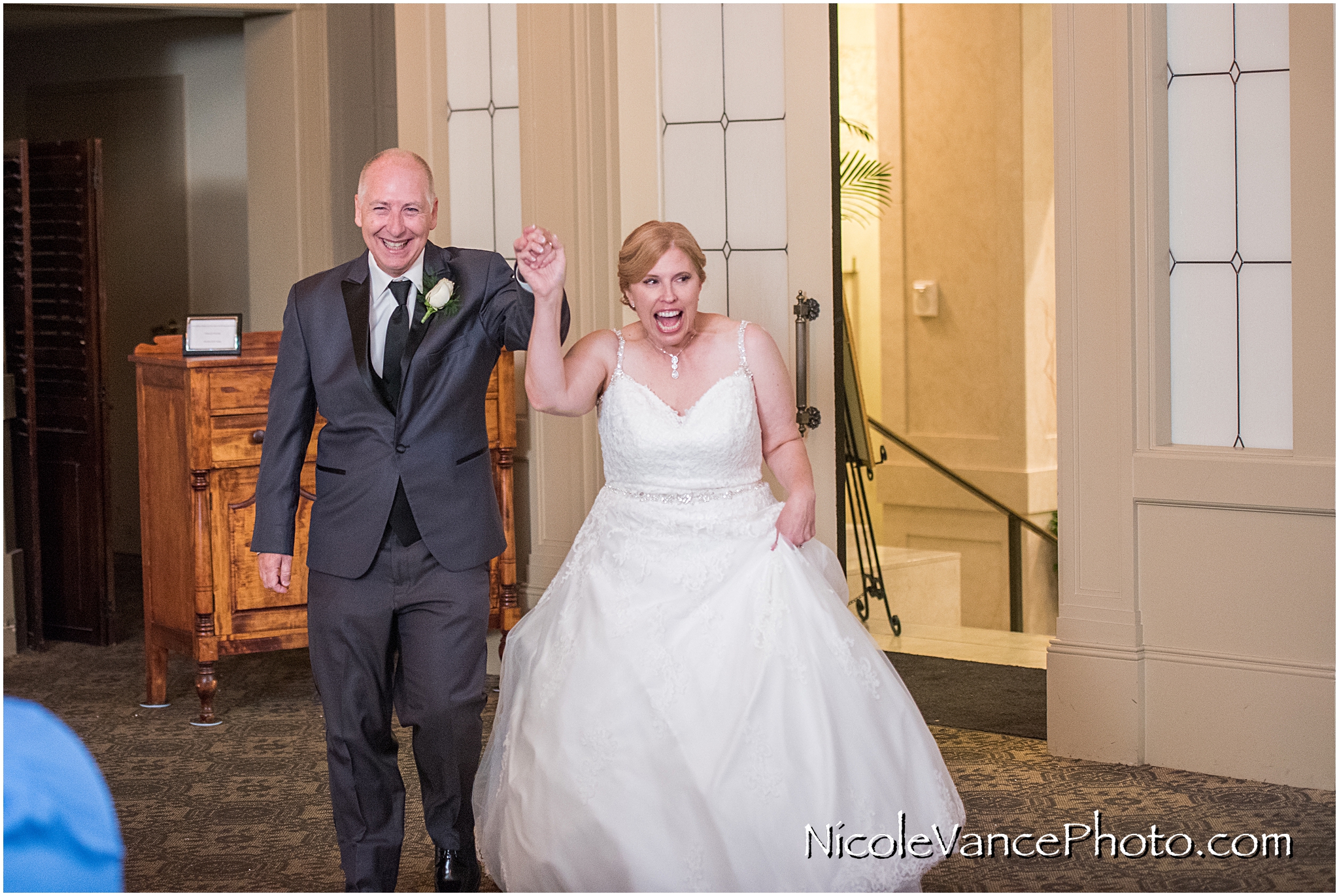 Reception entrance by the bride and groom at the Hotel John Marshall.