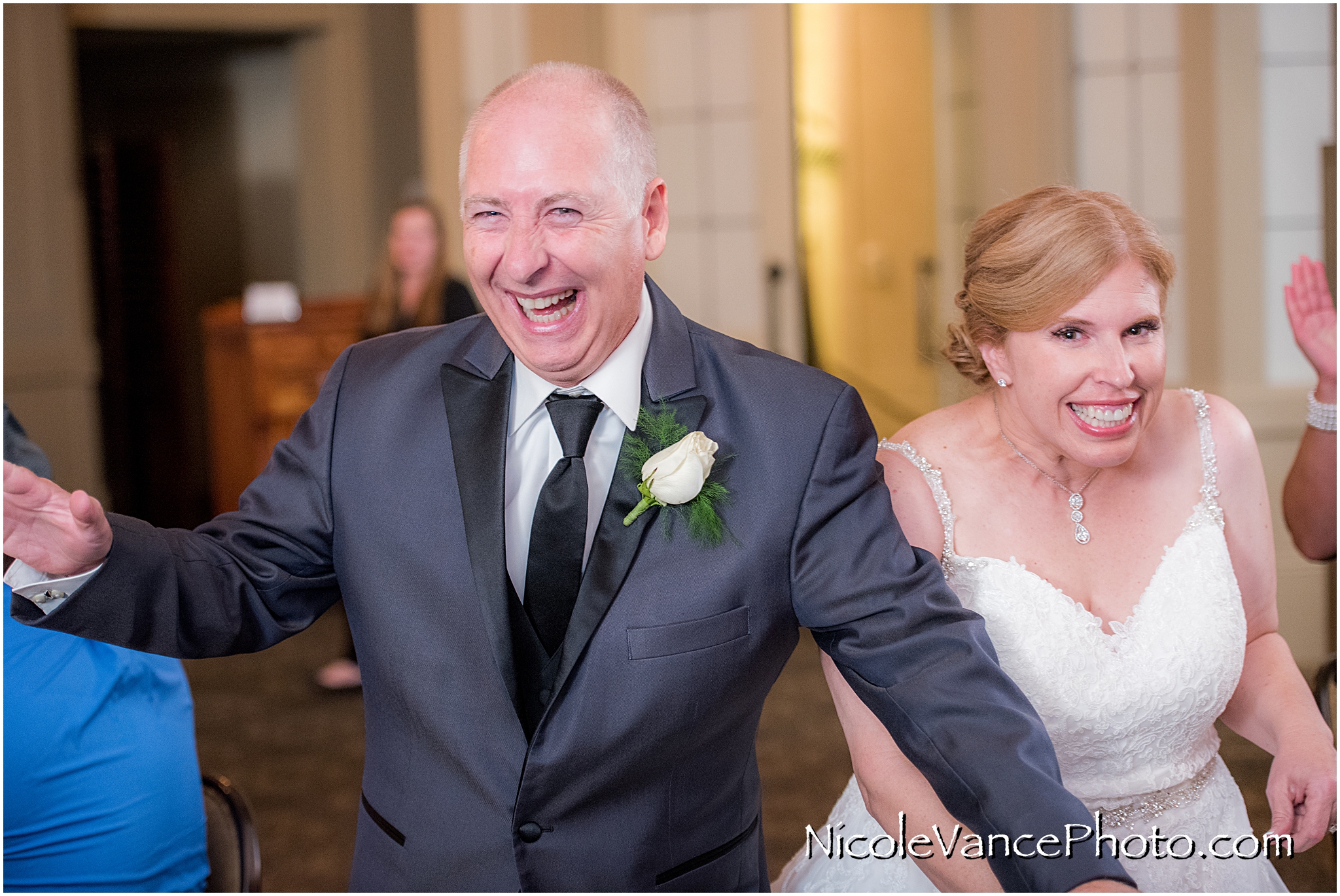 Reception entrance by the bride and groom at the Hotel John Marshall.