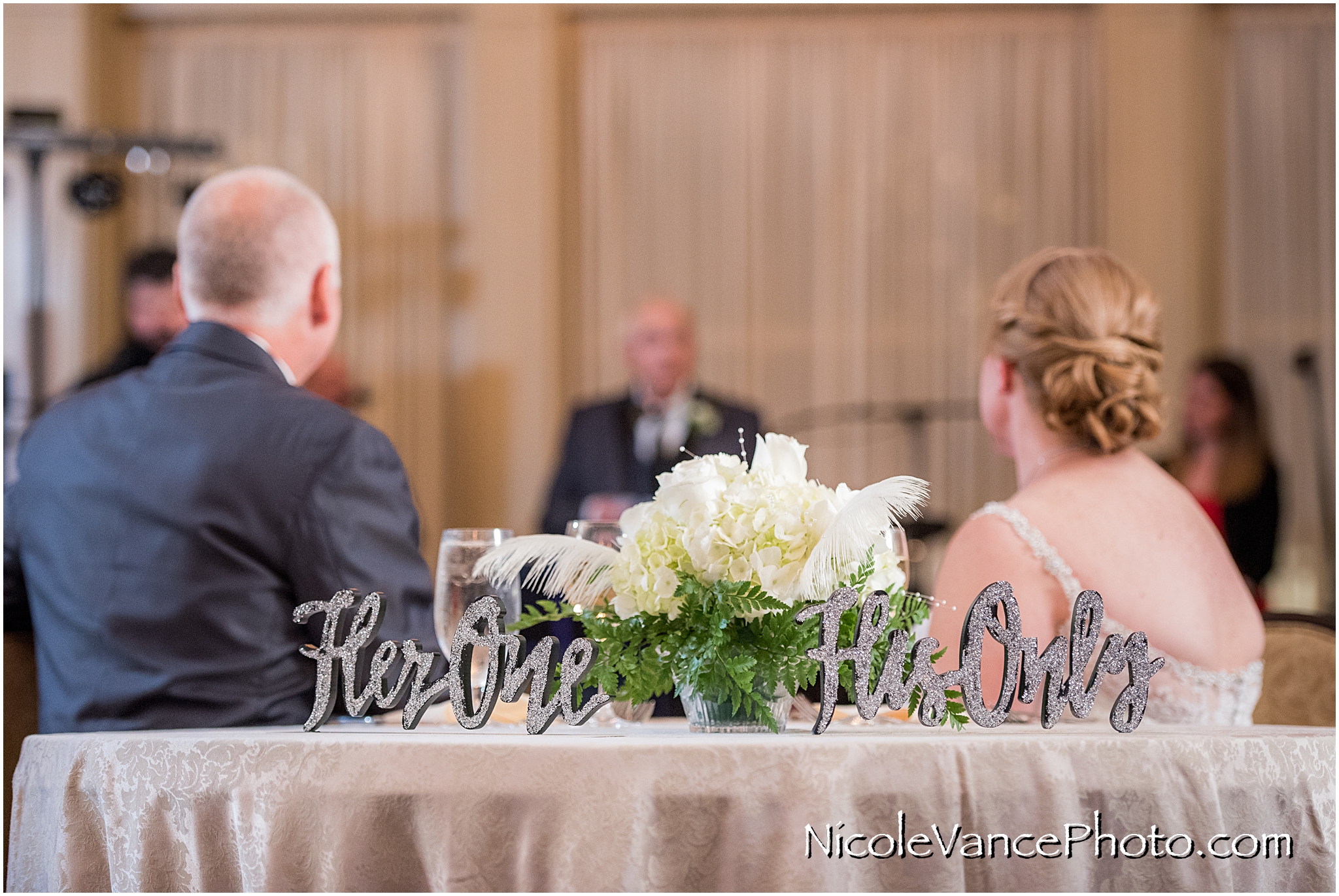 The bride's father makes a toast at the Hotel John Marshall.