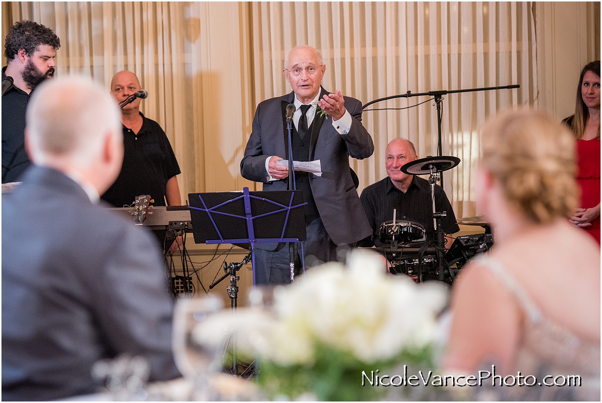 The bride's father makes a toast at the Hotel John Marshall.