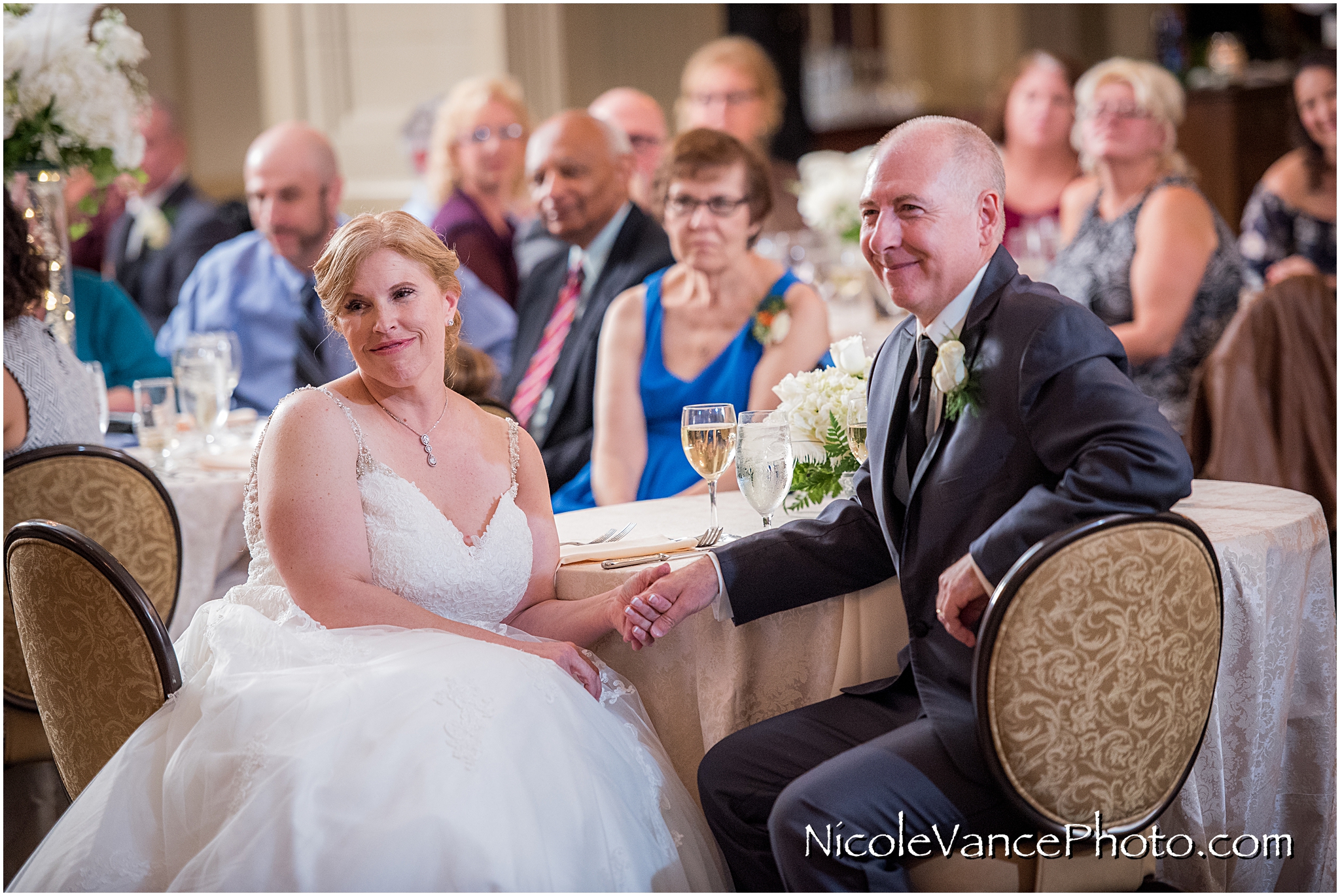 The bride's father makes a toast at the Hotel John Marshall.