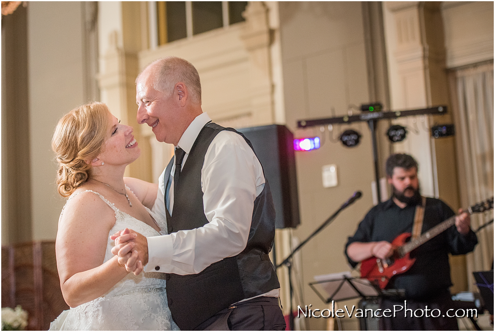 The happily married couple enjoy their reception at the Hotel John Marshall.