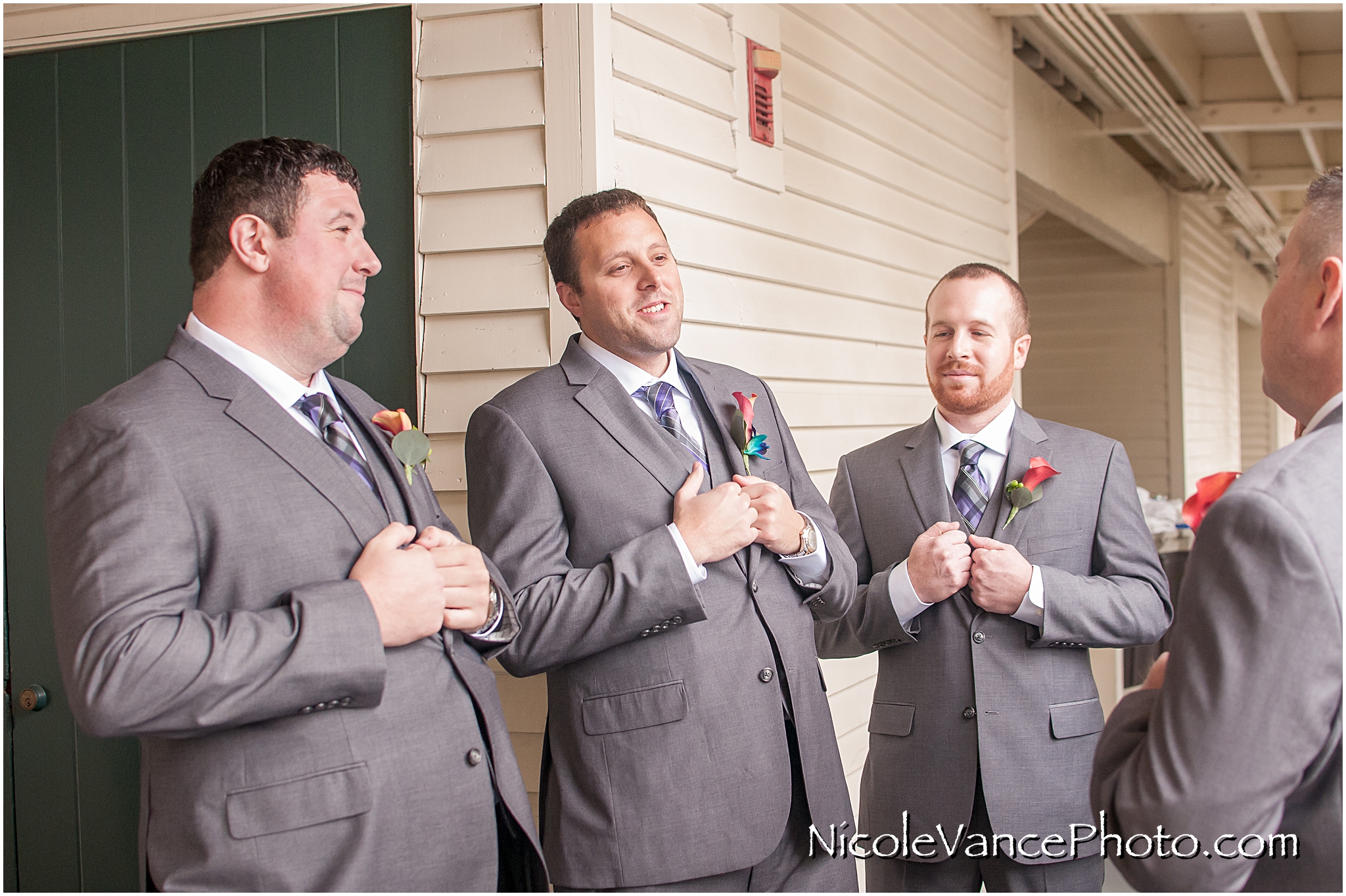 The groom enjoys a few minutes together with his groomsmen at the Linden Row Inn, in Richmond, VA.