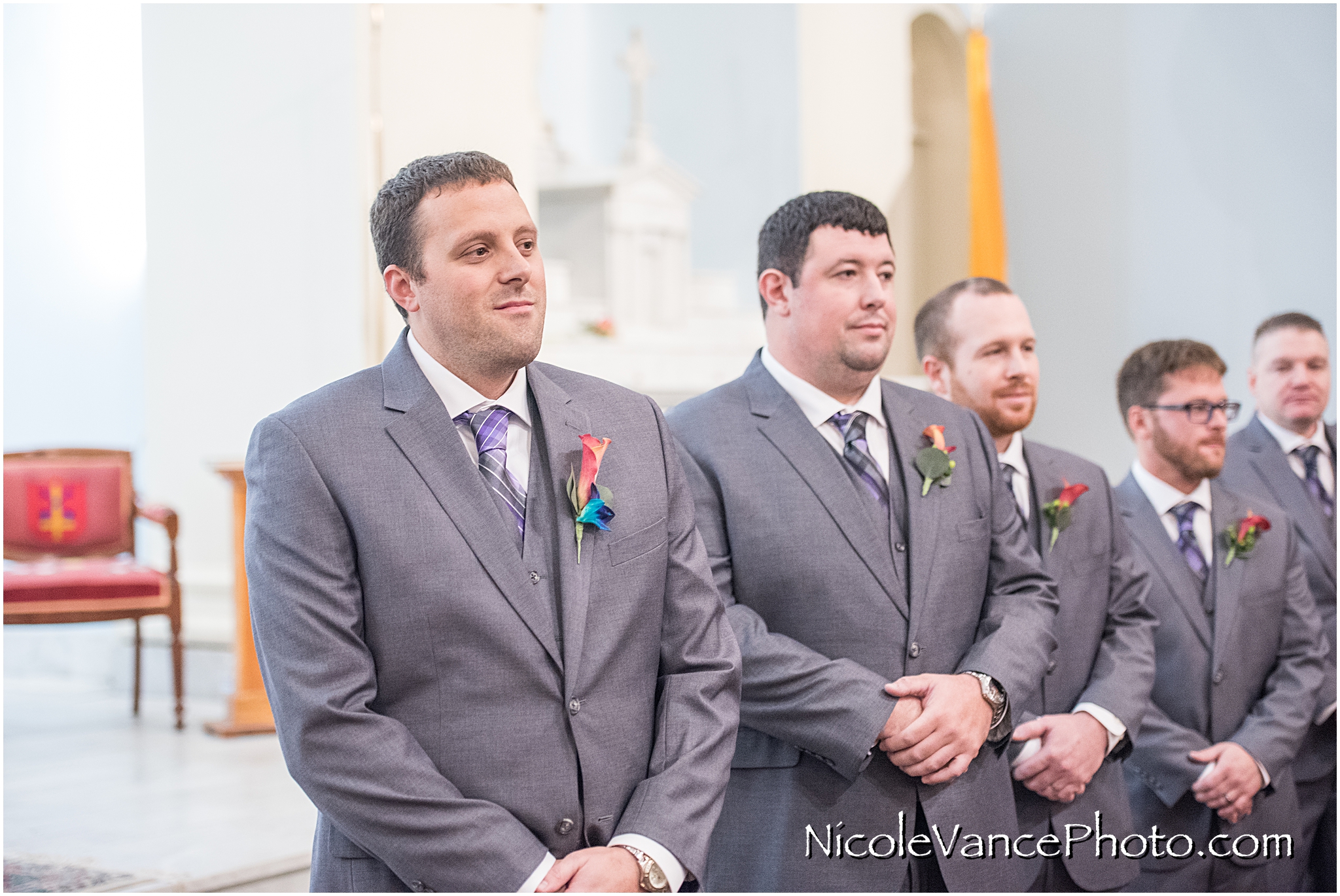 The groom sees his bride enter at St Peter's Catholic Church, in Richmond VA.