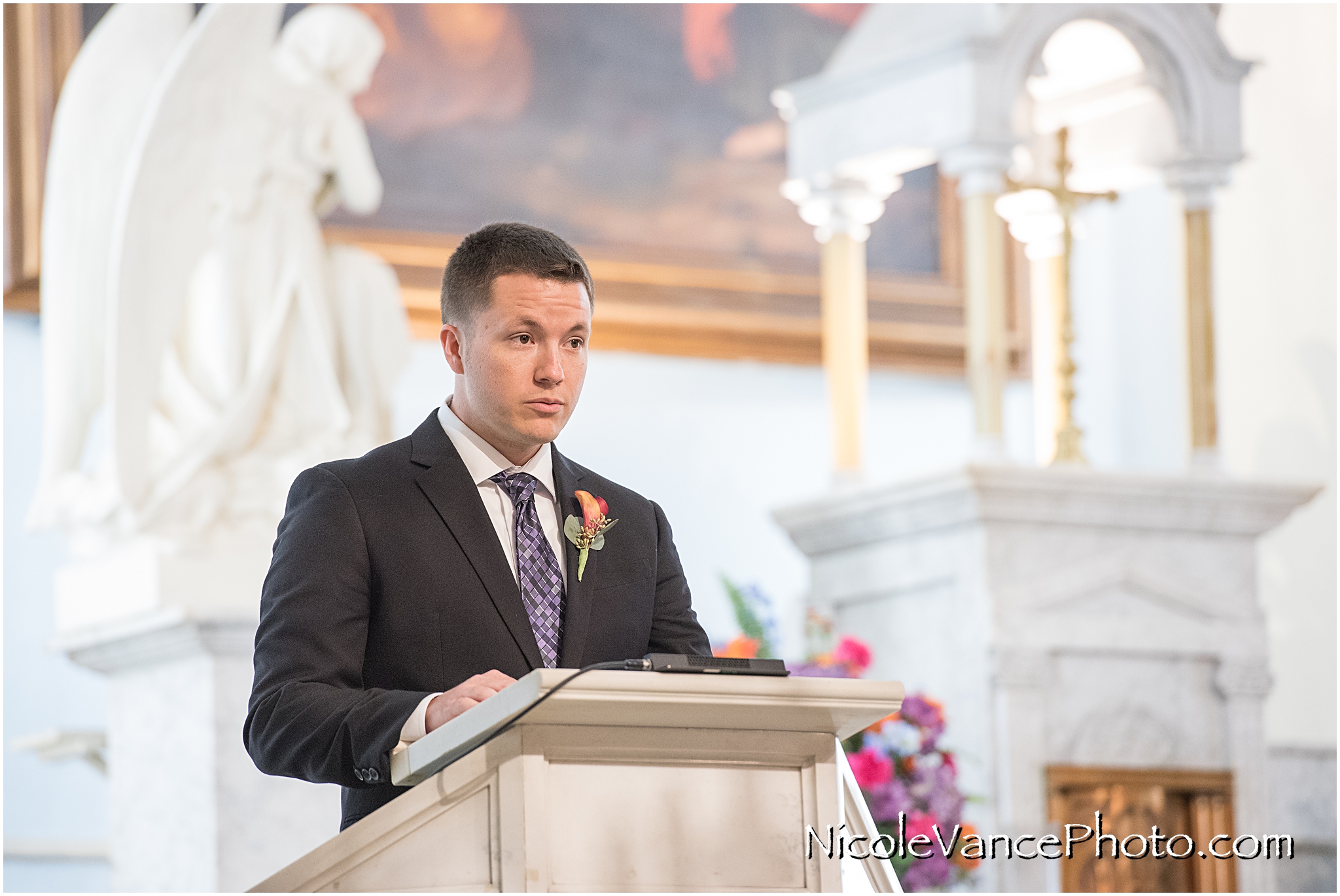 Scripture is read during a wedding ceremony at St Peter's Catholic Church in Richmond, Virginia.