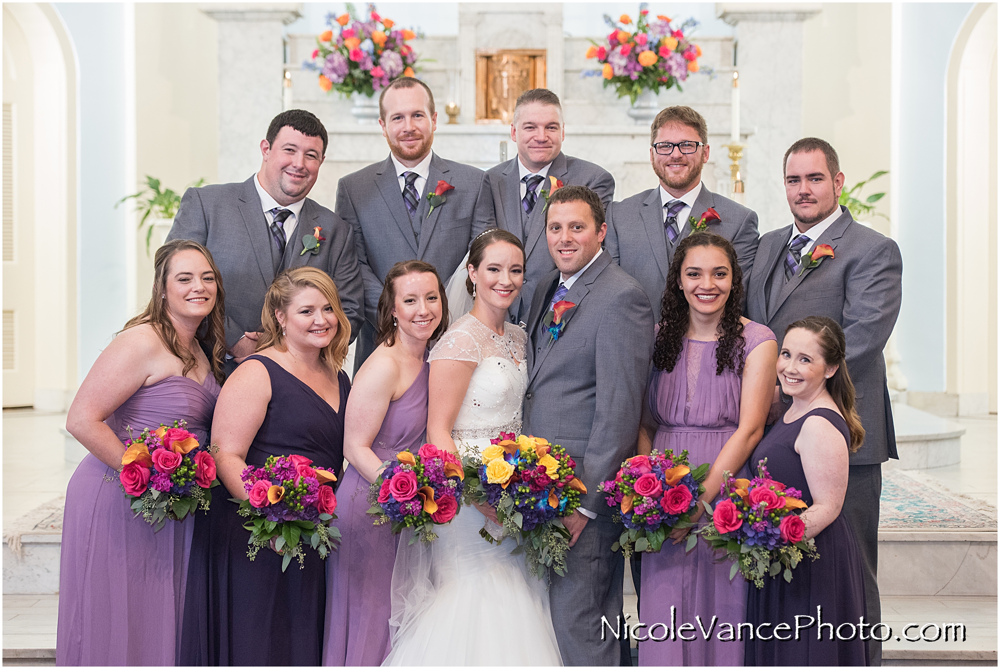 Bridal party photos in St Peter's Church in Richmond Virginia.
