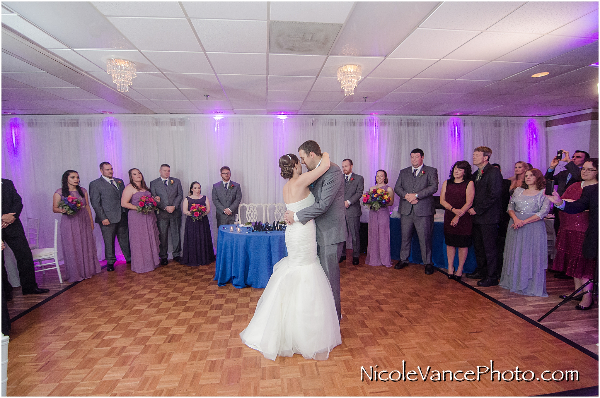 The bride and groom enjoy their first dance at their wedding reception at The Brownstone.