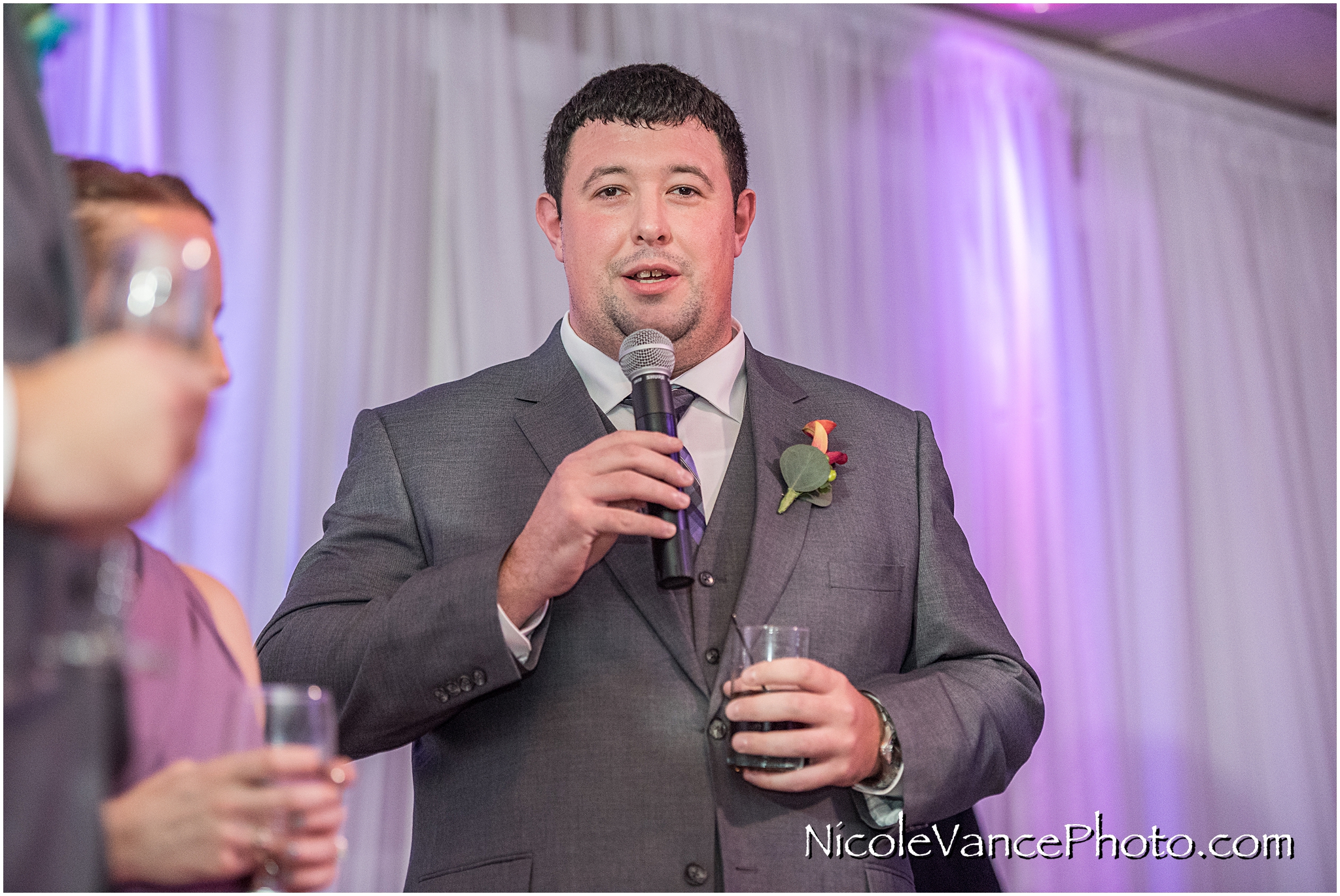 The best man makes a toast to the bride and groom at The Brownstone in Richmond, VA.