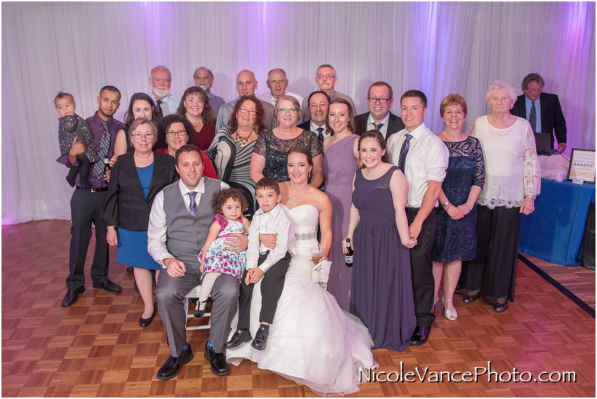 Extended family photo during the wedding reception at the Brownstone.