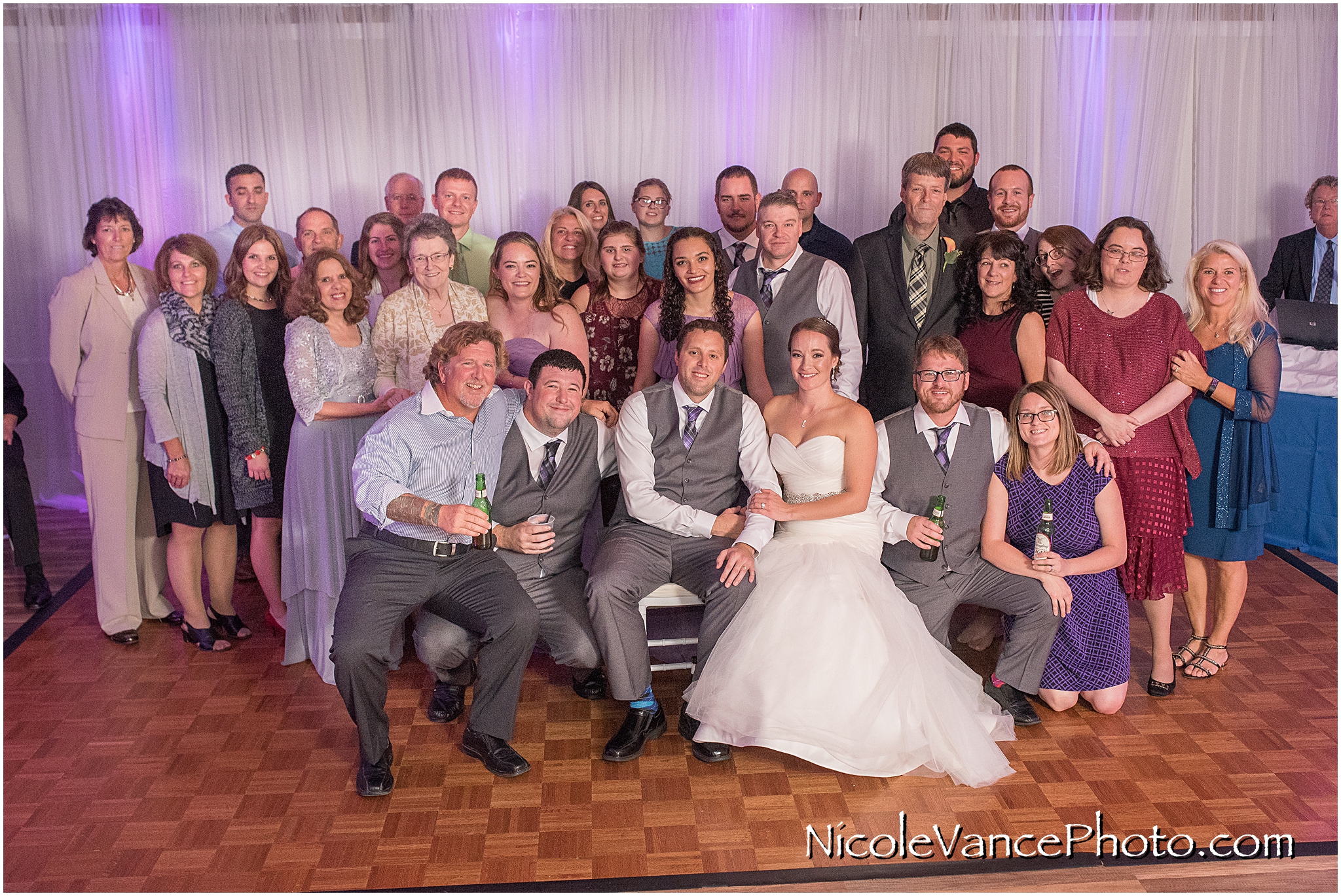 Extended family photo during the wedding reception at the Brownstone.