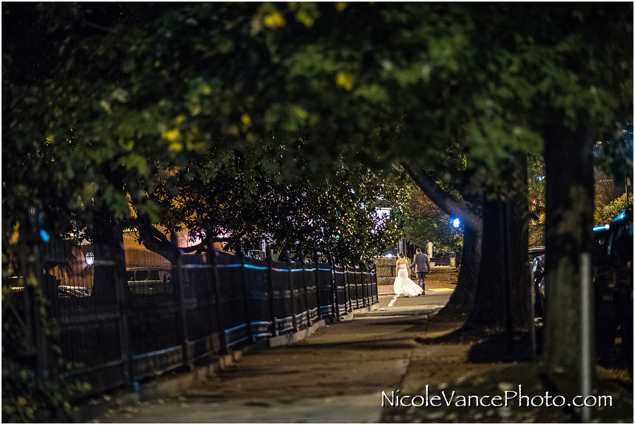 The bride and groom escape on foot to their honeymoon suite.