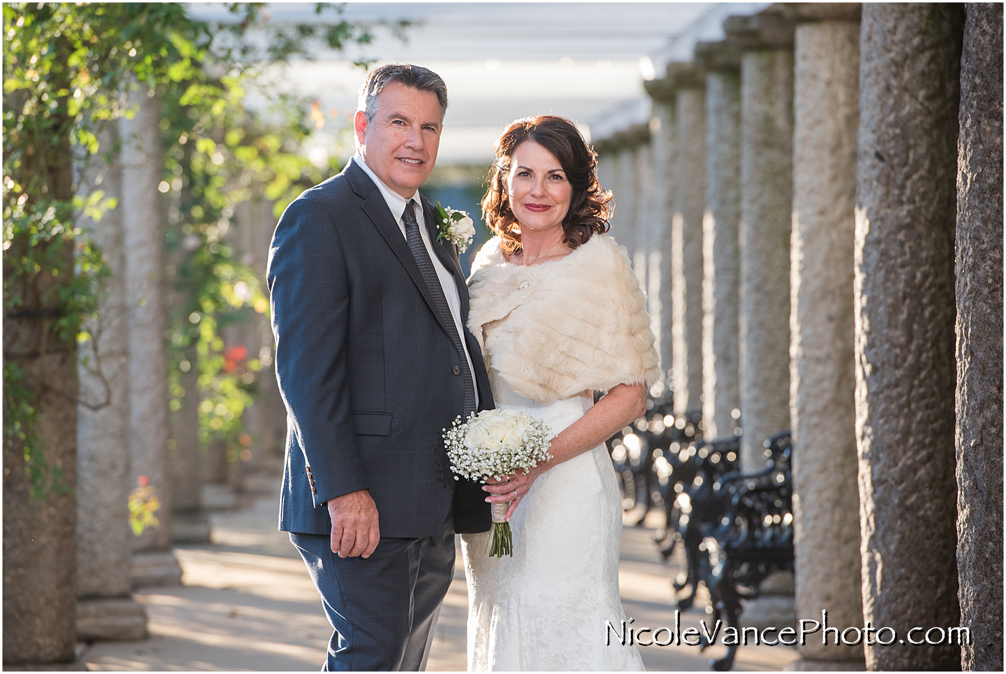 The bride and groom pose in the Italian Garden at Maymont Park in Richmond, VA.