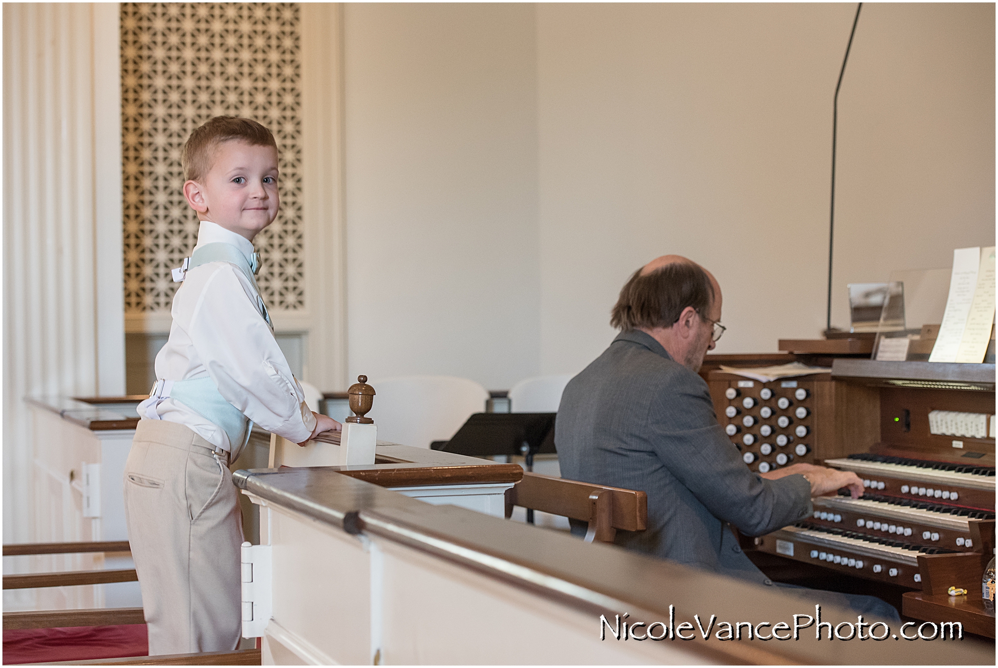 The ring bearer gets a closer look at the organist at Crestwood Prebyterian Church in Richmond, VA