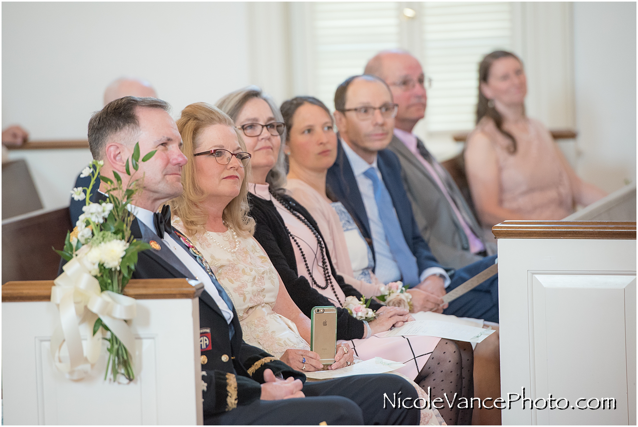 Guests enjoy the wedding ceremony at Crestwood Presbyterian Church in Richmond VA