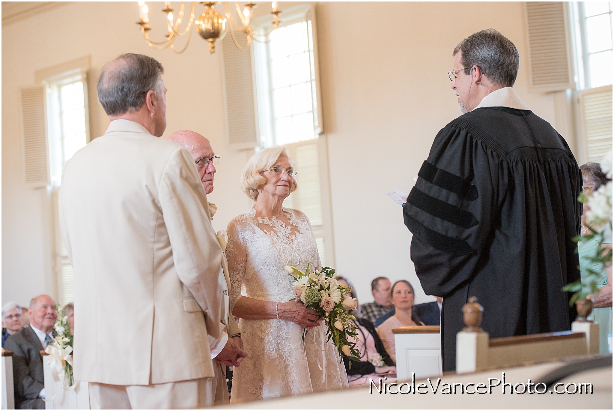 Vow exchange during the wedding ceremony at Crestwood Presbyterian Church in Richmond VA