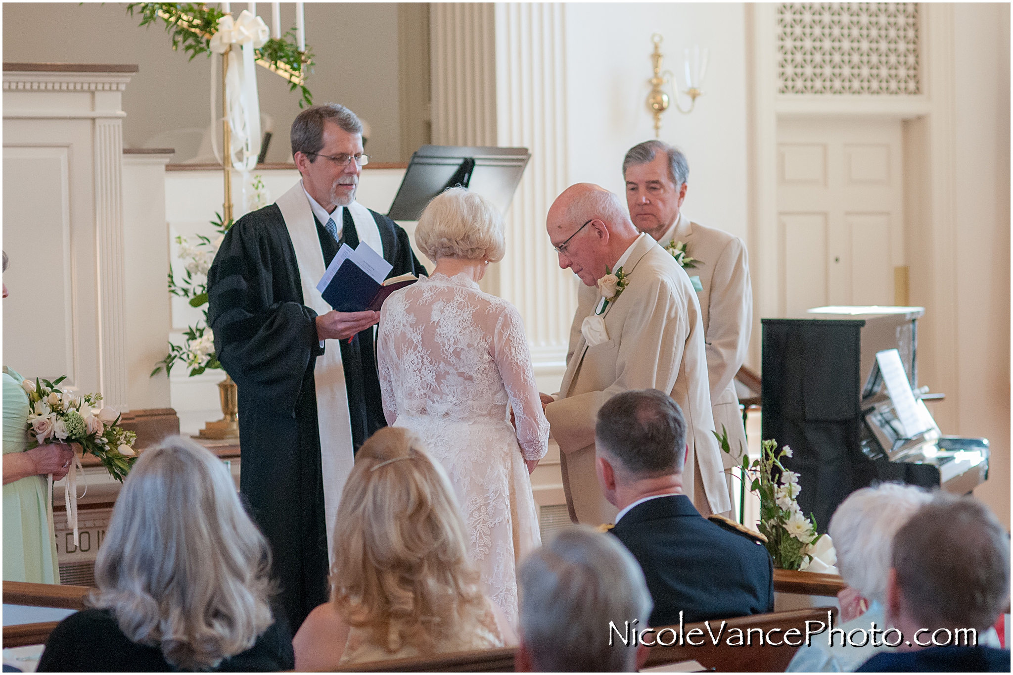 Ring exchange during the wedding ceremony at Crestwood Presbyterian Church in Richmond VA