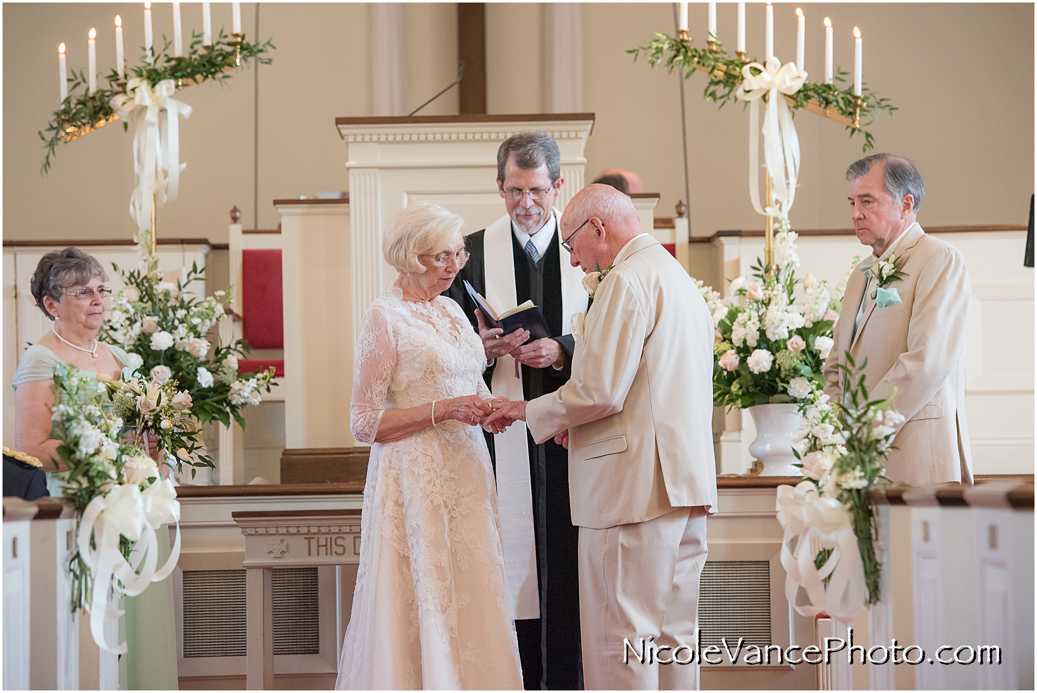 Ring exchange during the wedding ceremony at Crestwood Presbyterian Church in Richmond VA