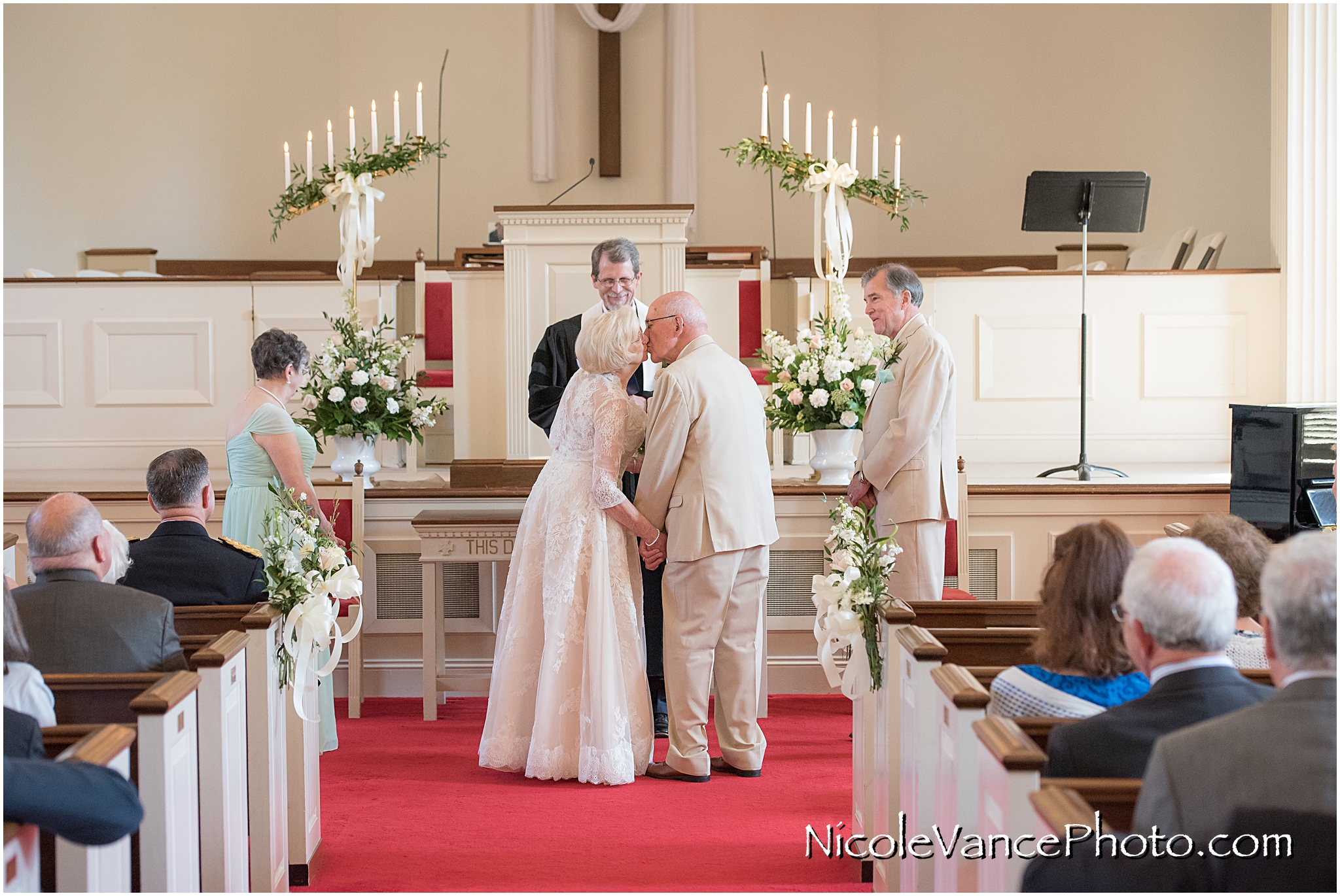 The first kiss during the wedding ceremony at Crestwood Presbyterian Church in Richmond VA