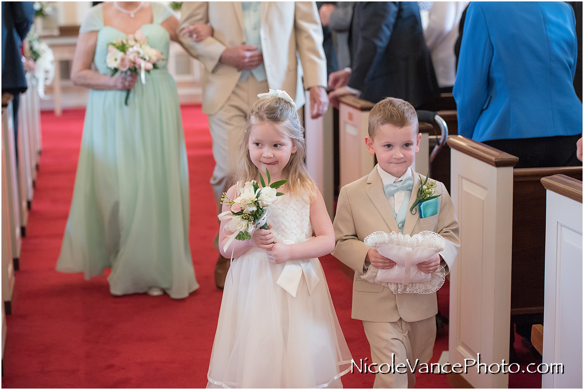 Flower girl and ring bearer walk down the aisle at Crestwood Presbyterian Church in Richmond VA